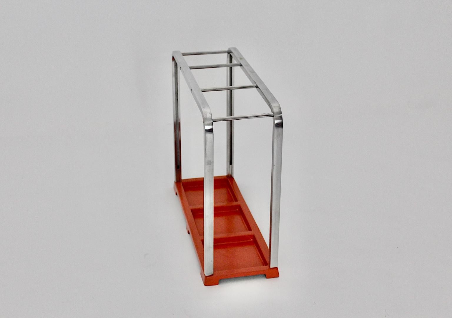  Bauhaus Art Deco era vintage umbrella stand, which was made of cast and polished aluminum.
The base was newly lacquered in the originally red color, while the upper part consists of gentle curved polished aluminum in cleaned condition.
The umbrella