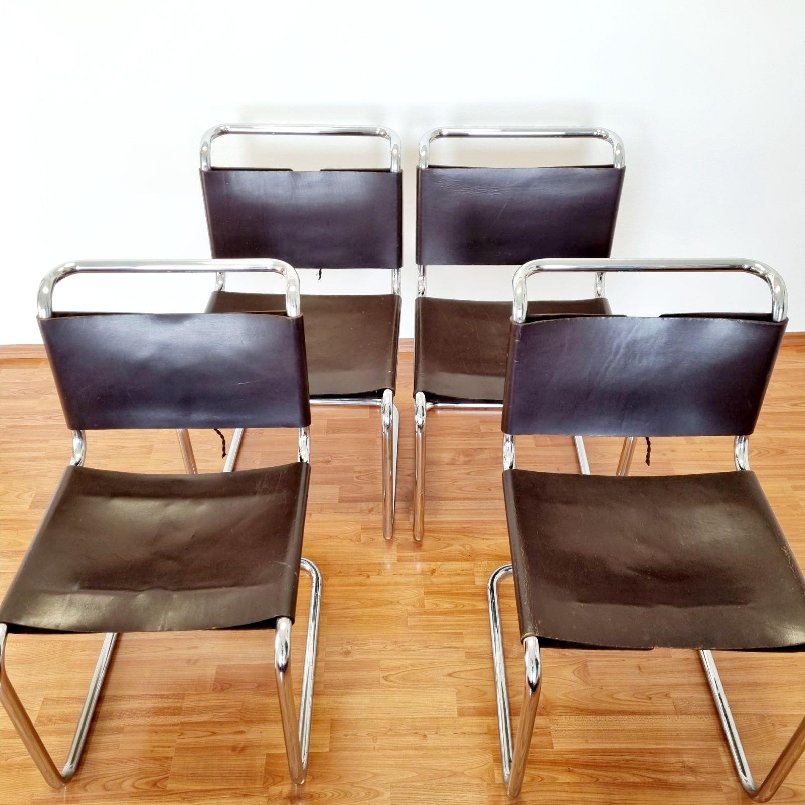 Set of 4 chairs B33 designed by Marcel Breuer in dark brown leather. Produced by Gavina in the 60s.

They are in good vintage condition with minor traces of age, as visible on photos.
