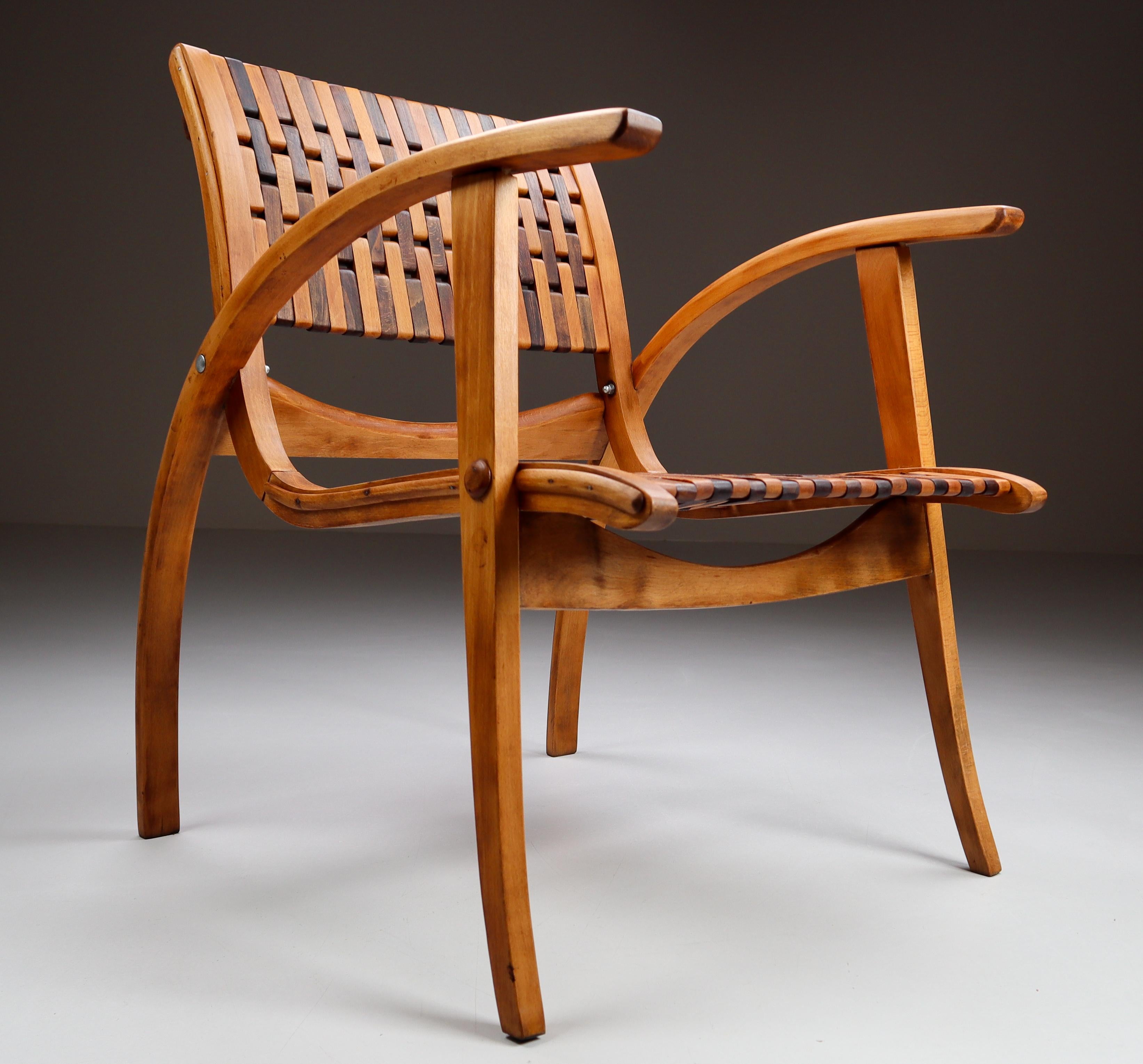 Bauhaus bentwood armchair by Erich Dieckmann, Germany, 1930s

This German armchair is executed with bentwood and webbed seat and back designed by Erich Dieckmann and created in the 1930s. The design features the Bauhaus philosophy, in which form