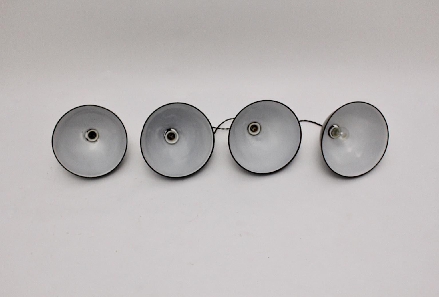 Metal Bauhaus Black and White Vintage Set of four Email Hanging Lamps, 1920s, Germany For Sale