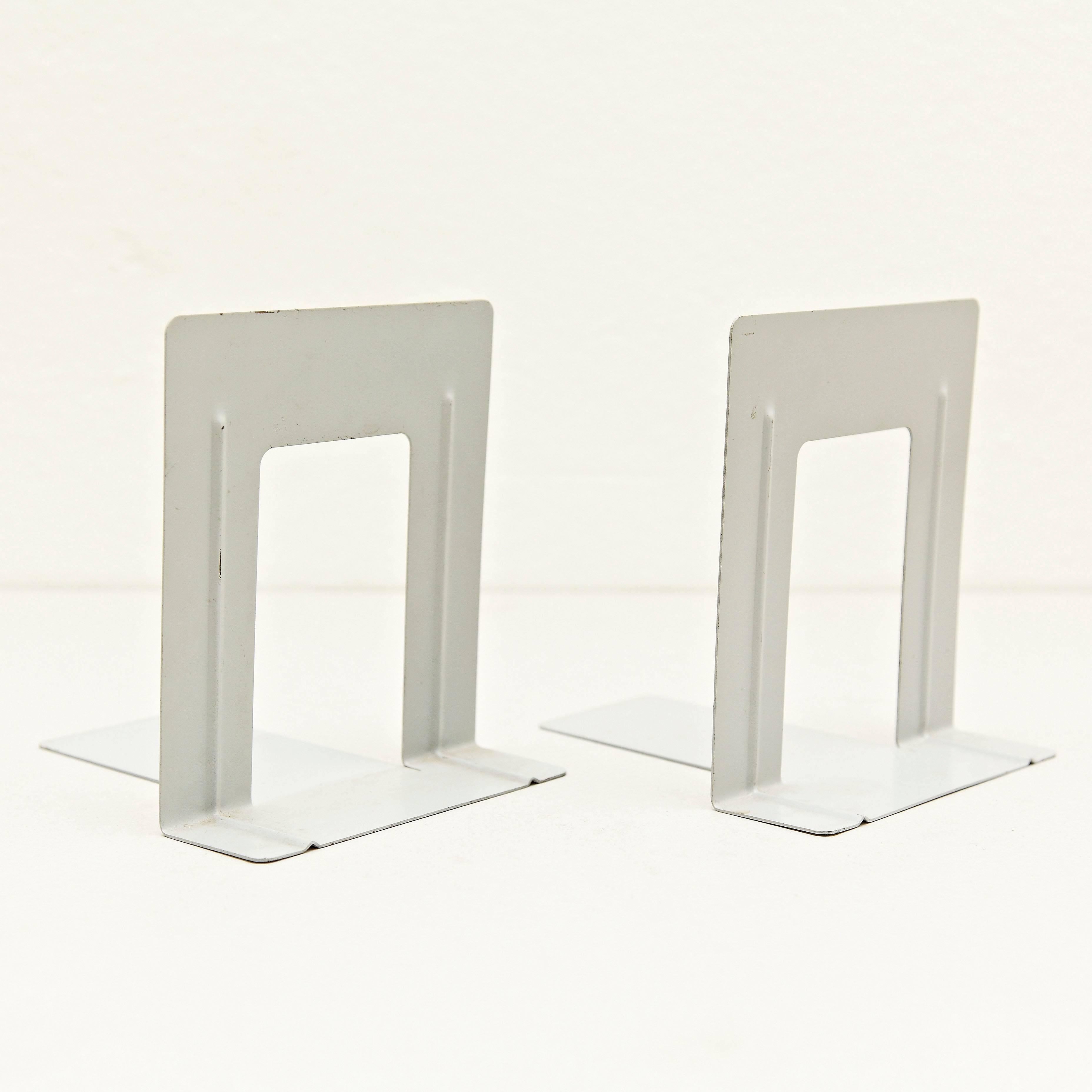 Bauhaus metal book holders, manufactured in Germany, circa 1940.

In great original condition, with minor wear consistent with age and use, preserving a beautiful patina.