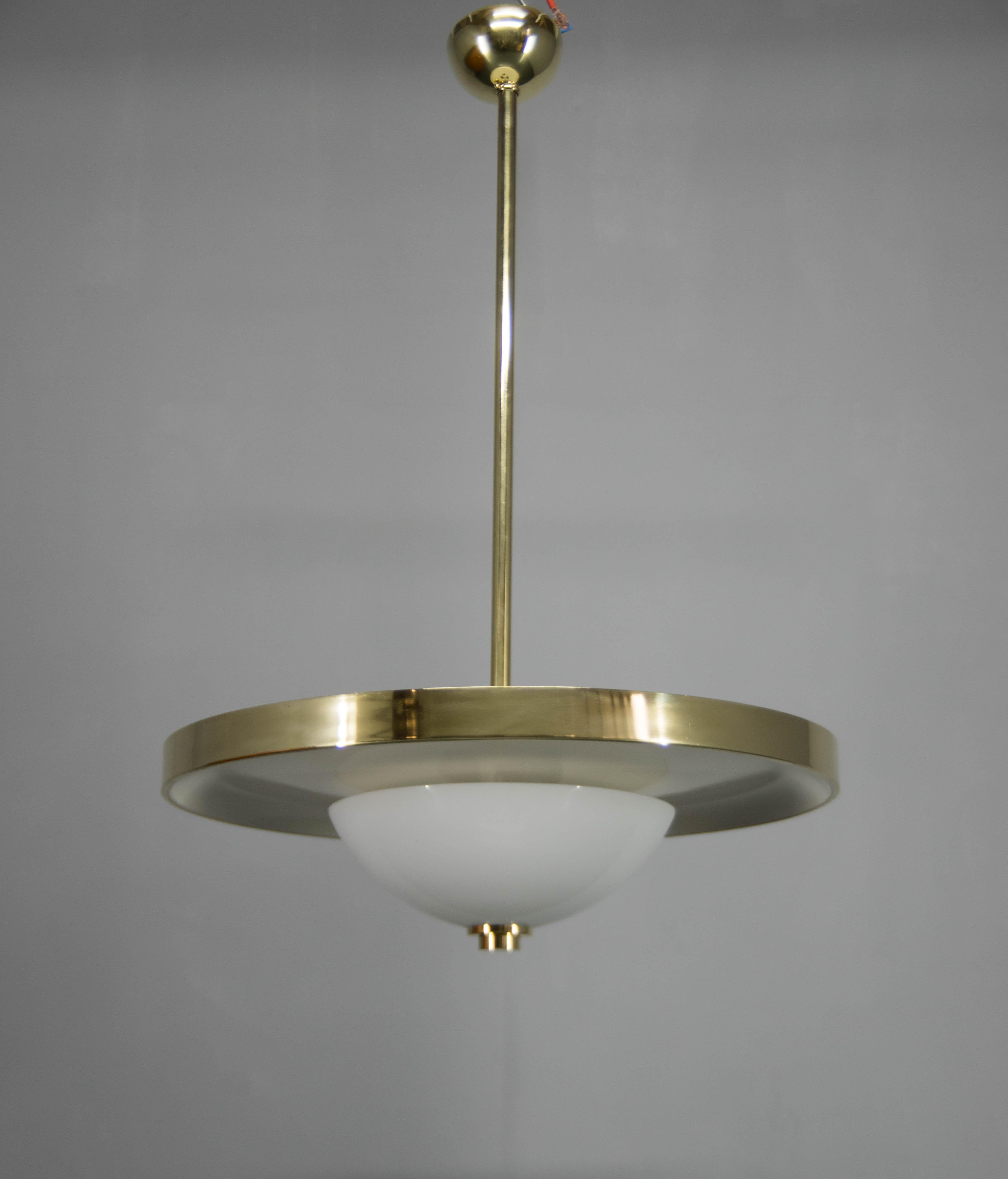 Large elegant Bauhaus chandelier designed by Franta Anyz and executed by IAS in 1930s. 
Restored: brass refinished, new ivory paint and rewired - two separate circuits: 3+3x60W, E25-E27 bulbs
US wiring compatible