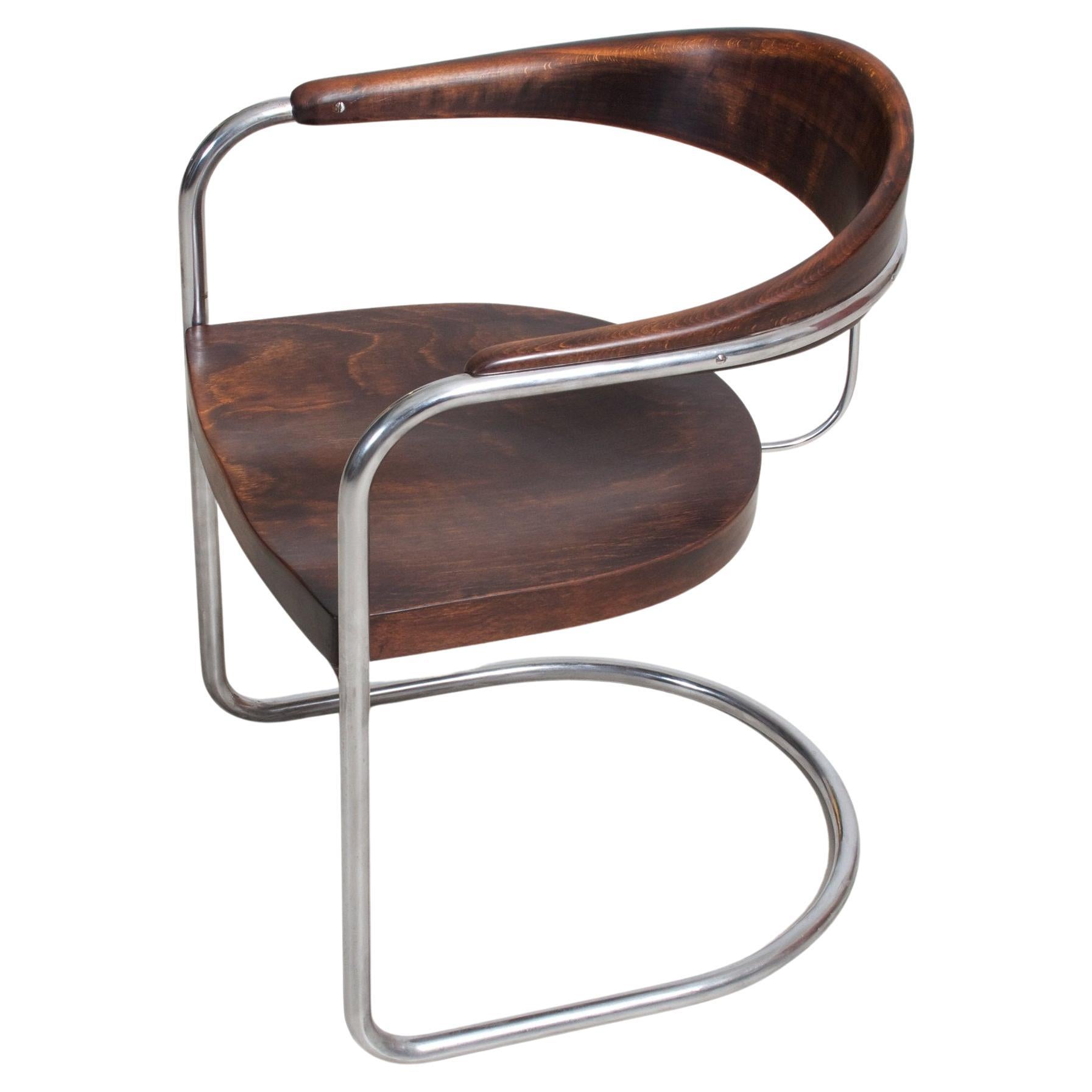 Freitragender Bauhaus-Sessel der Gebrüder Luckhardt, verchromtes Metall, gebeiztes Holz