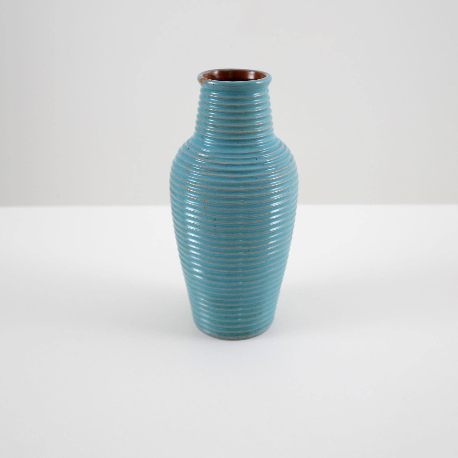 Original Bauhaus ceramic vase with horizontal grooves decor and glaze in cyan tone, Germany, 1930. Monogrammed W on the base.