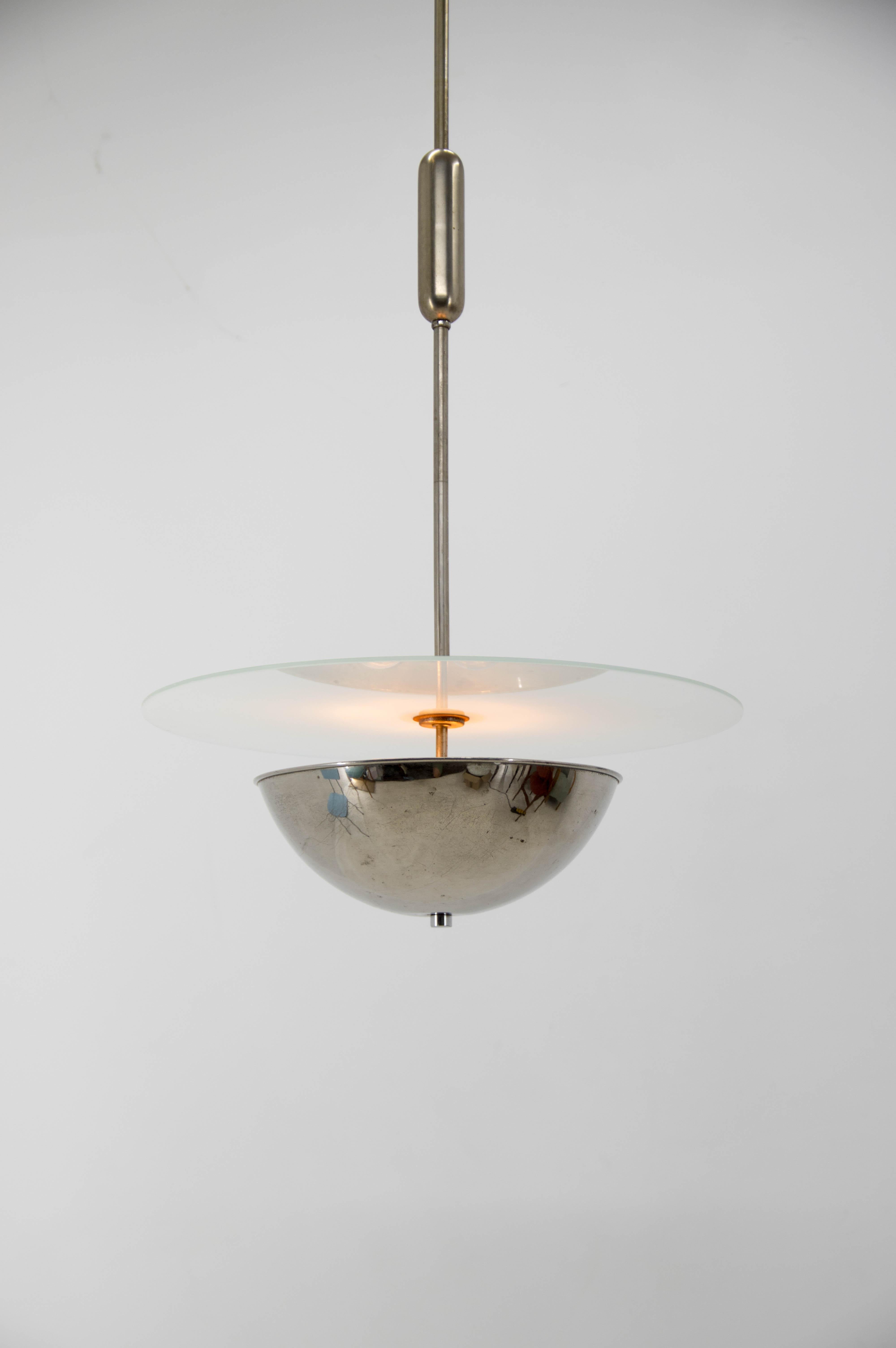 Simple and elegant Bauhaus chandelier.
Chrome with age patina
Sandblasted glass in perfect condition
Rewired - 2x60W, E25-E27 bulbs
US wiring compatible.