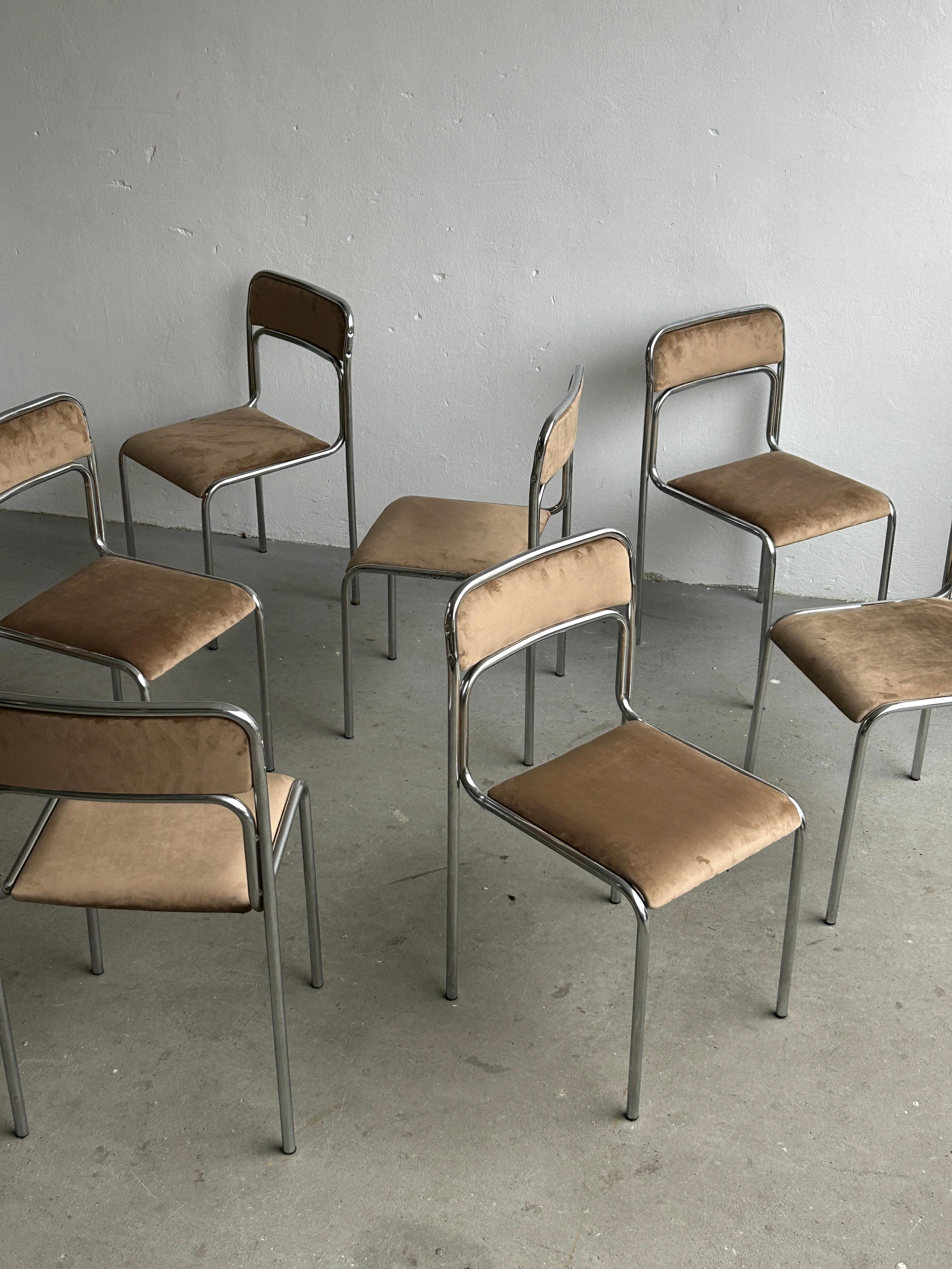 1 of 7 Italian modernist, Bauhaus design tubular chrome and beige velvet stackable dining or living room chairs.

Italian production, circa 1970s-1980s.

All chairs have been re-upholstered in quality Italian beige velvet.

In good vintage condition
