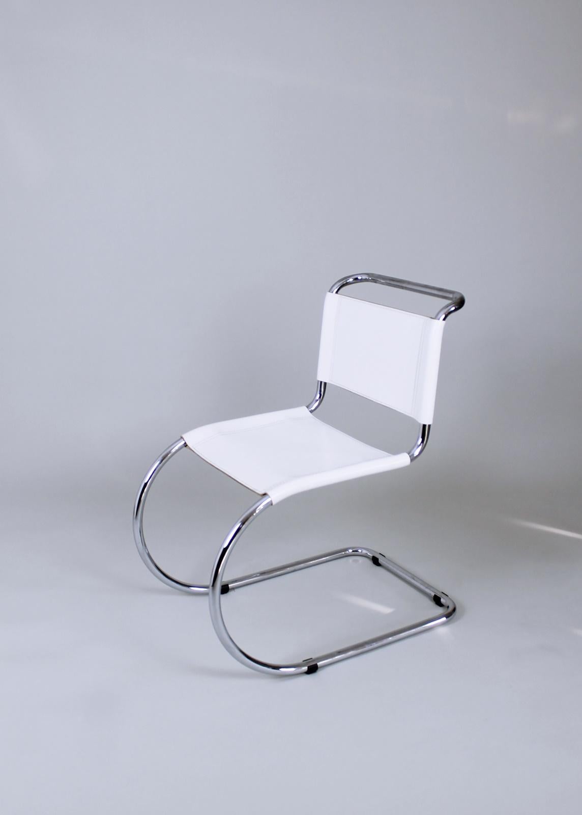 Rare vintage white leather MR 10 cantilever chairs, designed by Mies Van Der Rohe.
 Produced in Germany.
 The leather does have some scratches. This adds to the charm and age of the chairs but it is in good shape overall.
 The chrome is shiny, no