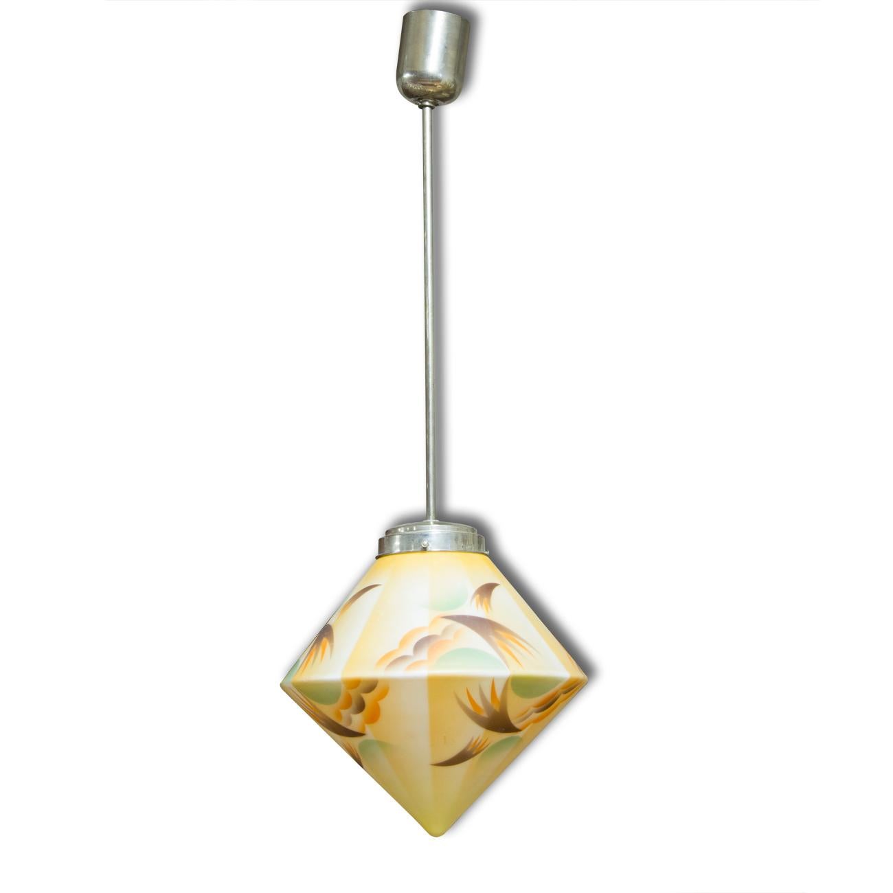 Bauhaus pendant lamp on a chromed steel frame and with an opaline glass triangular shade. It was made in 1930s in Central Europe. In excellent condition. Original wiring. Functionality has not been tested. If you are interested, we will provide a