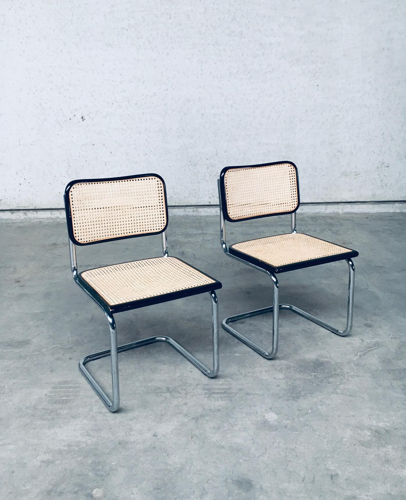 Vintage Bauhaus Design CESCA Dining Chair set by Marcel Breuer. Made in Italy, 1980's / 90's period. Stamped; Made in Italy. Tubular chrome frame with black lacquered wood frame and cane webbing seat and back. They both come in good condition, with