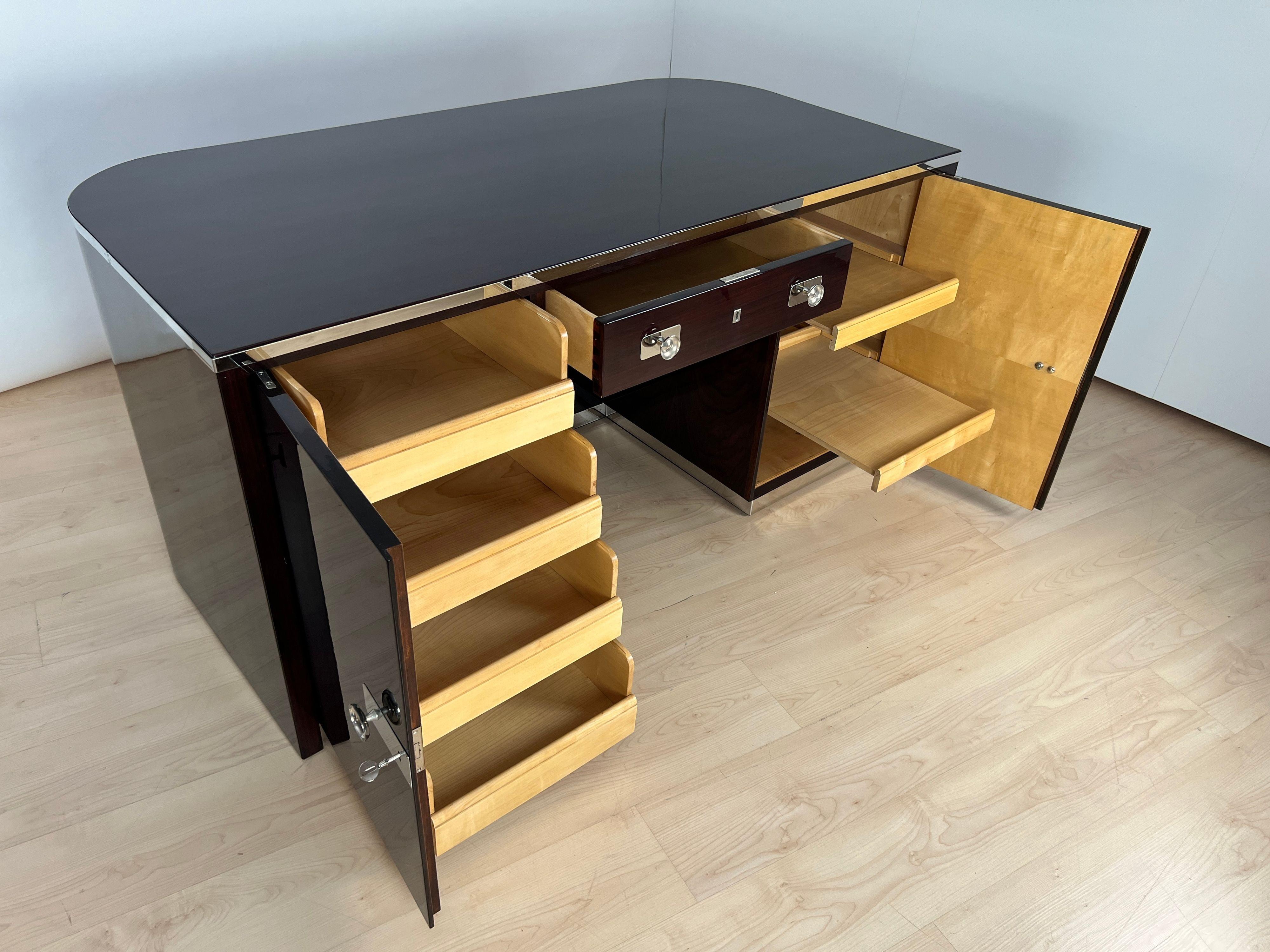 Original, fully restored Bauhaus Desk, attributed to Erich Dieckmann, Germany, 1923-1925 at the Bauhaus in Weimar.
Wonderful rosewood / Palisander veneer with excellent piano lacquer finish.
Inside in bright maple in satin finish and high-gloss