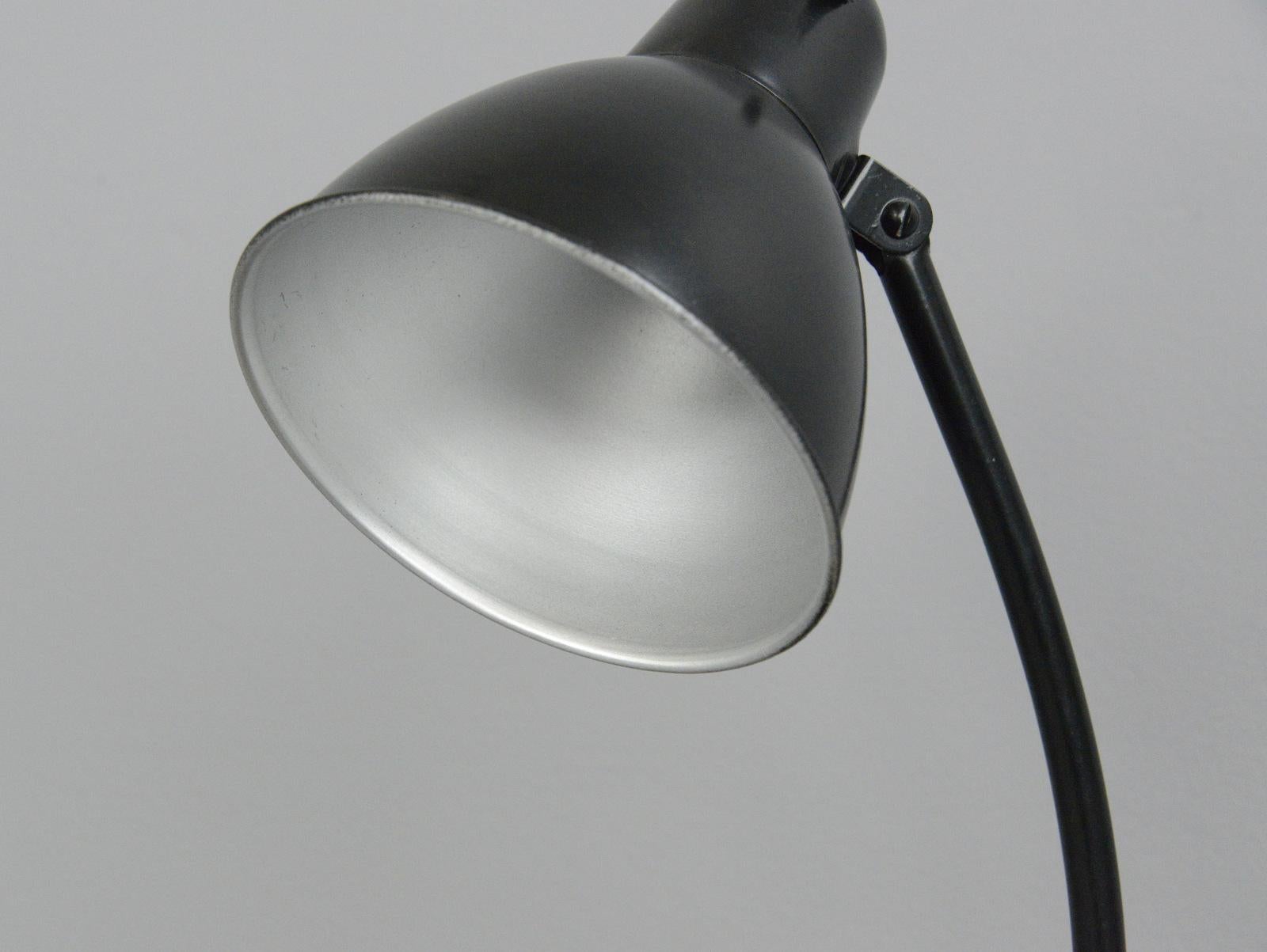 Bauhaus desk lamp by Siemens, circa 1930s

- Cast iron base
- Adjustable steel arm and shade
- Takes E27 fitting bulbs
- Produced by Siemens, Berlin
- German, 1930s
- Measures: 45cm tall x 21cm deep x 16cm wide

Condition report:

Fully