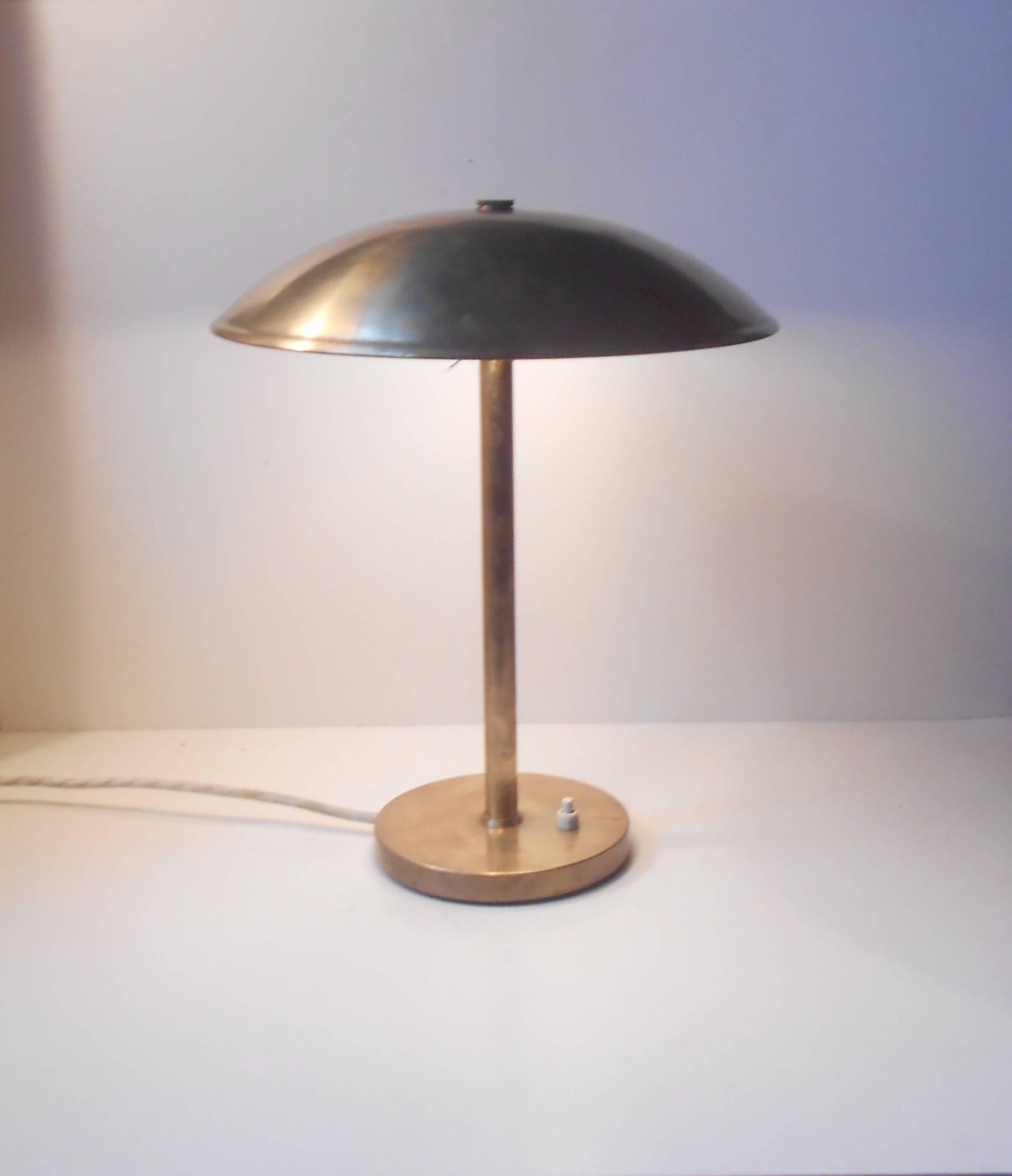 Some believe this table lamp was designed by Christian Dell and is often referred to as the 