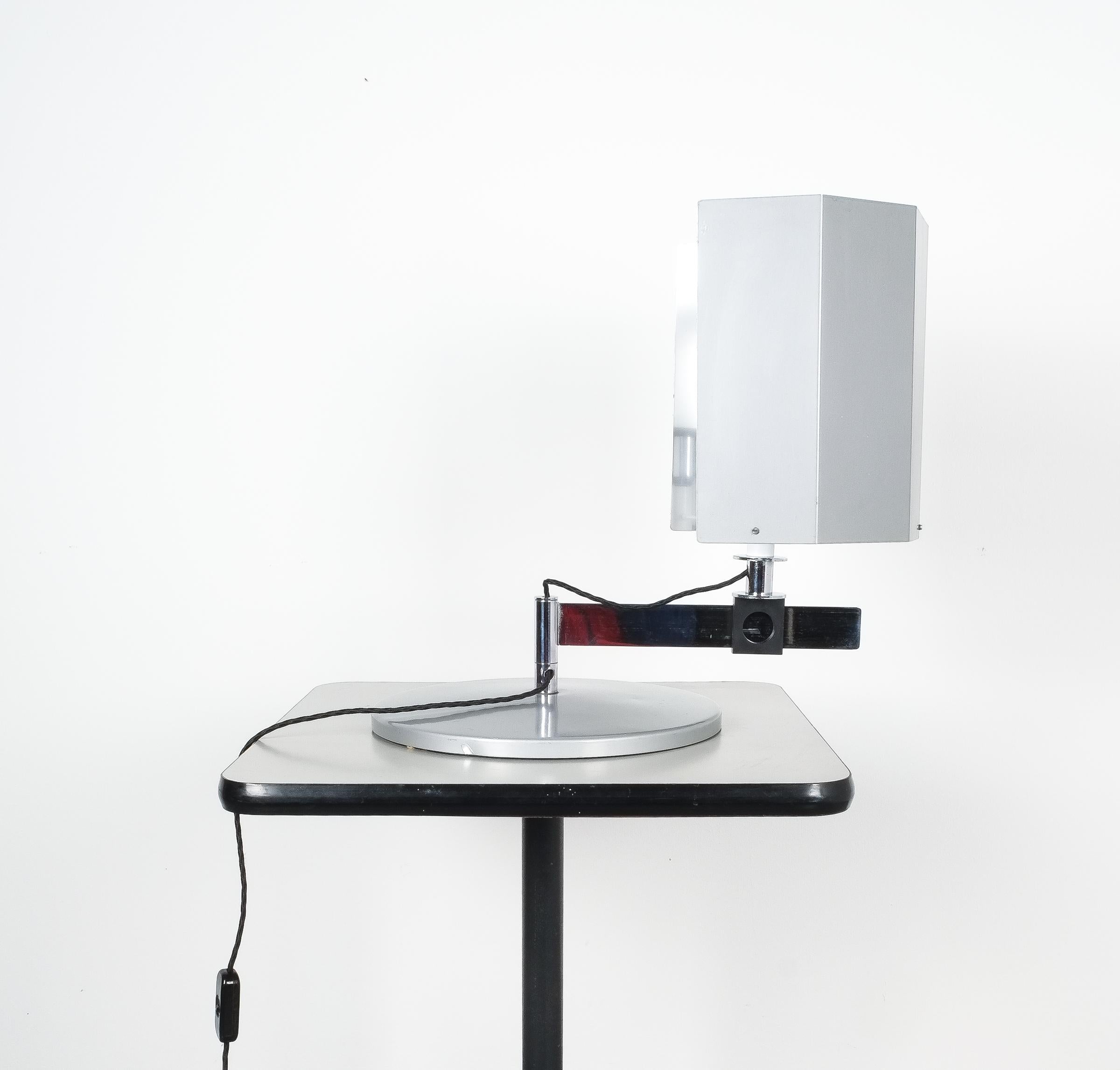 Bauhaus desk light by Carl J. Jucker, Germany. 

Large table lamp originally designed in 1923 but deriving from a later production probably 1970s or 1980s. This metal desk light can be moved into all kinds of different positions. The shade of the