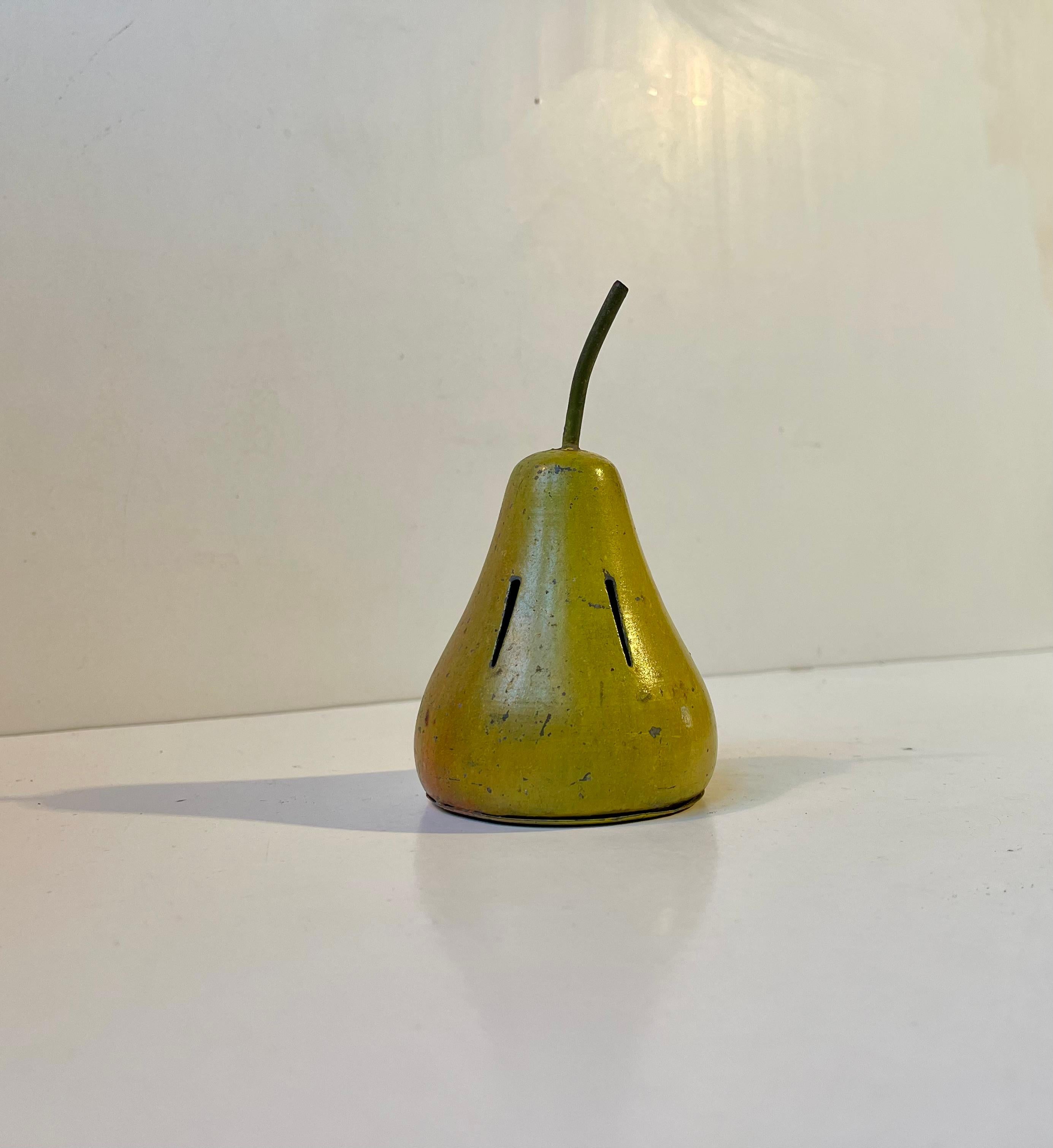As a protector//reducer of foul odors in the toilet or bedroom these small curious objects often disguised as a fruit or something humorous were popular during the 1920s in Scandinavia. Not many has survived and they are rare. This lovely naturally