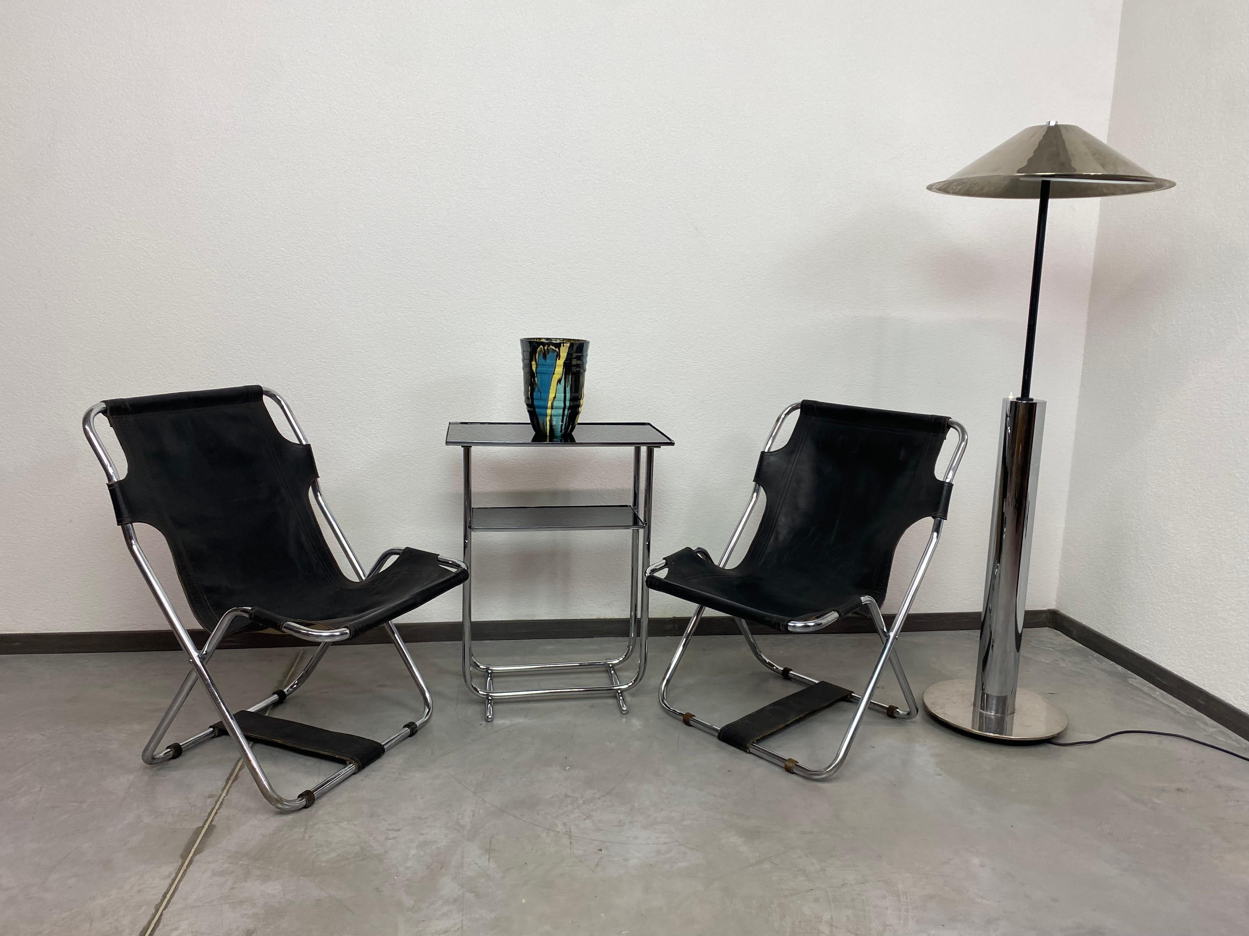 Leather folding chairs in Bauhaus style from around 1960 in very nice original condition with slight signs of use.