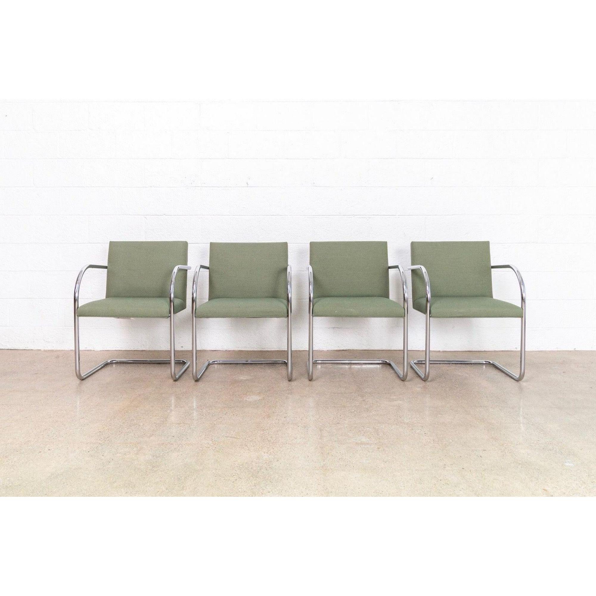 This set of four Mies van der Rohe Brno armchairs made by Gordon International are circa 1990. These iconic Bauhaus modernist chairs designed by Mies van der Rohe in 1930 feature clean lines and a simple profile. Model 504 has a cantilevered frame