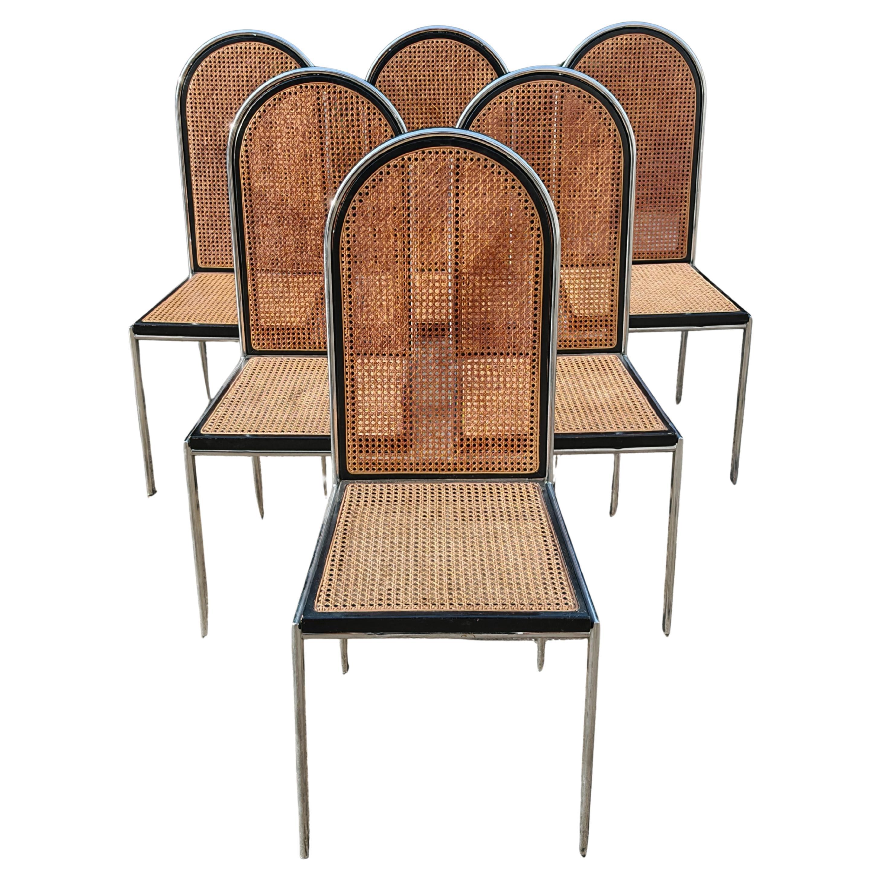 Bauhaus inspired Dining Chairs in beech and steel with cane seats and backrests in vendita