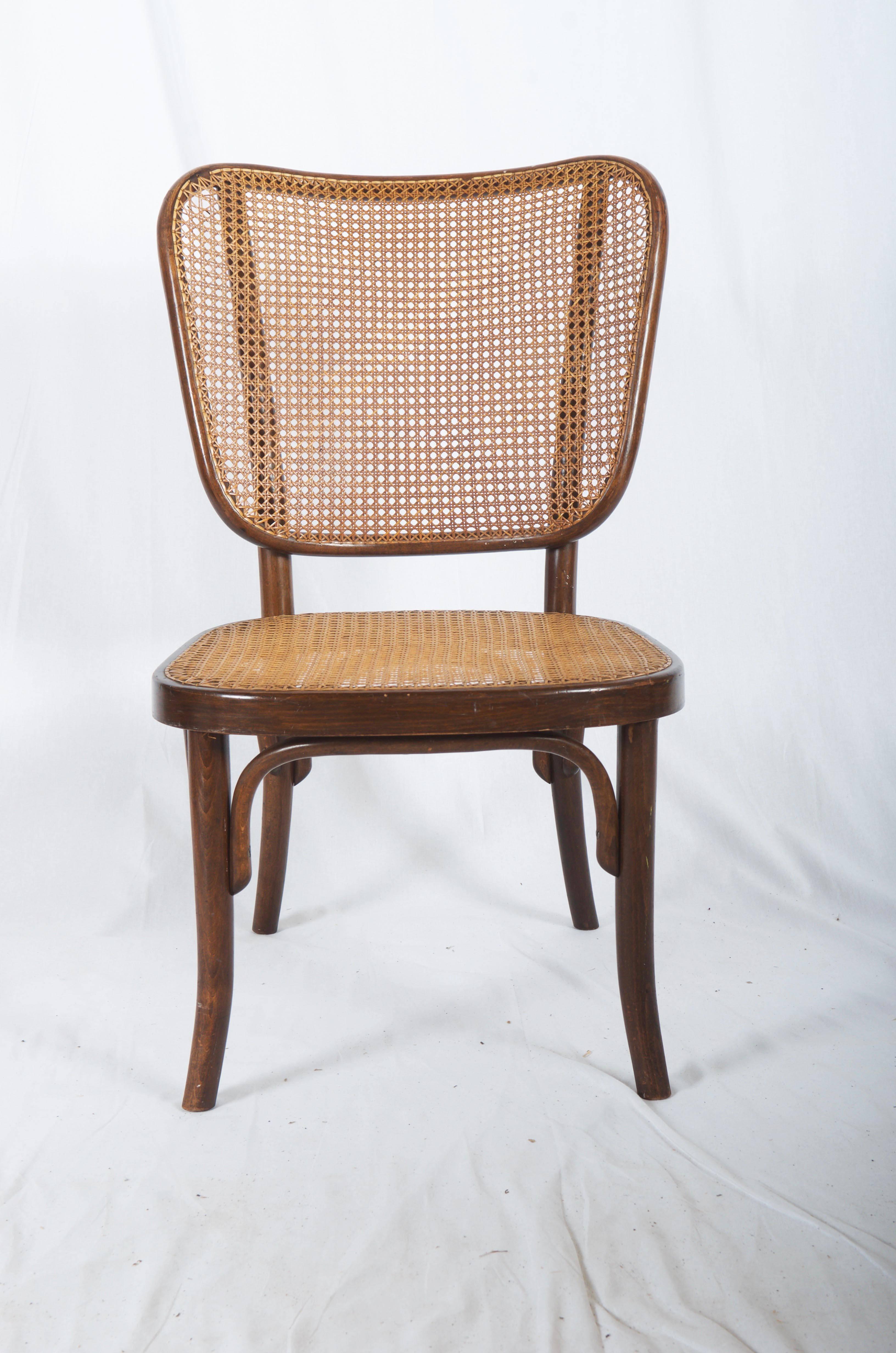 Beech bentwood with caned seat and backrest, designed by Gustav Adolf Schneck and made by Thonet in the late 1930s. Perfect unrestored original condition. Signed on the frame.
