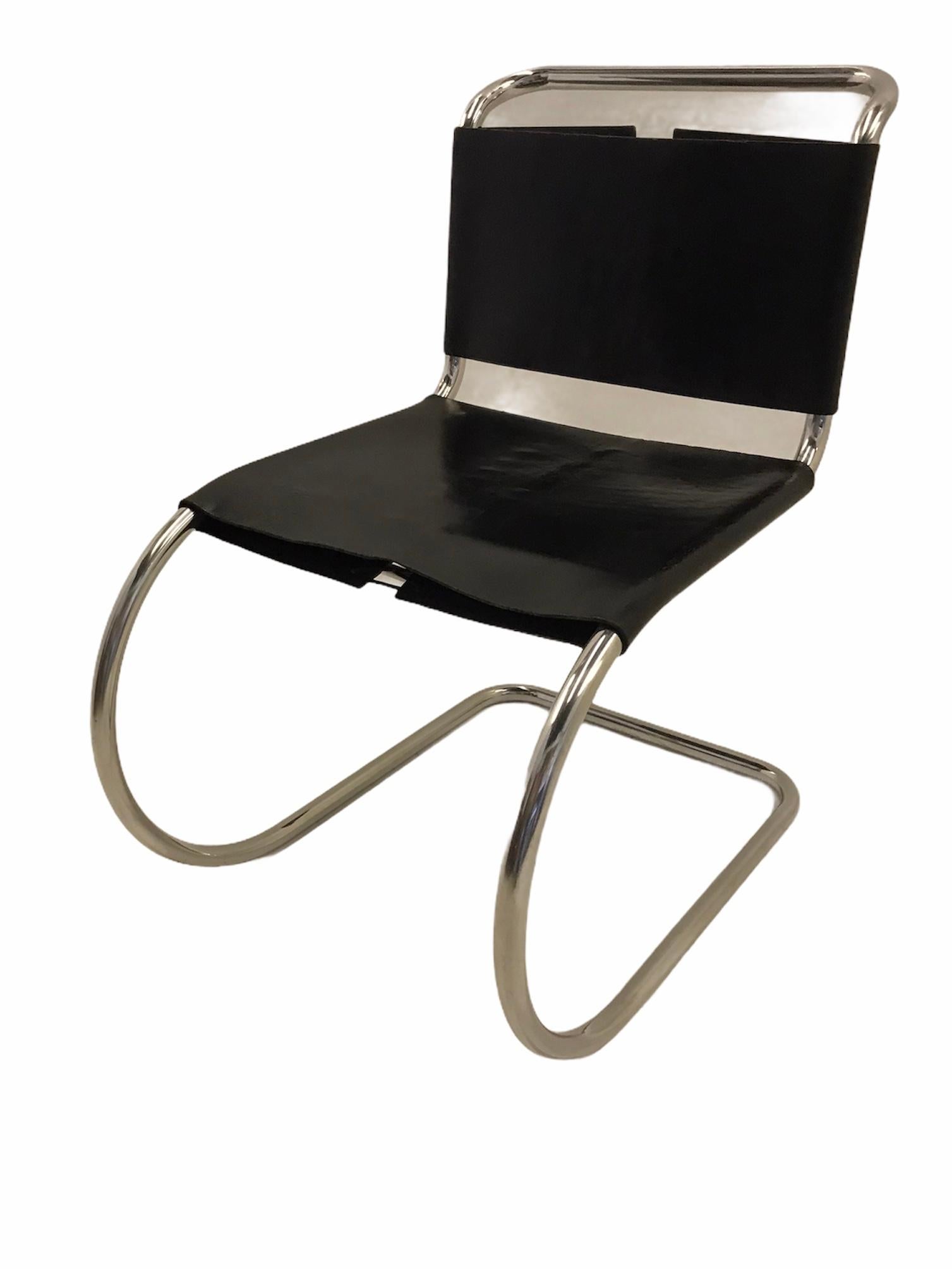 .Produced in the 1960s, Classic laced black leather and chrome Mies van der Rohe MR10 cantilever chair by Knoll International. New cord lacing on the back and seat. Retains the Knoll label.
The graceful, elegant, and beautifully proportioned 