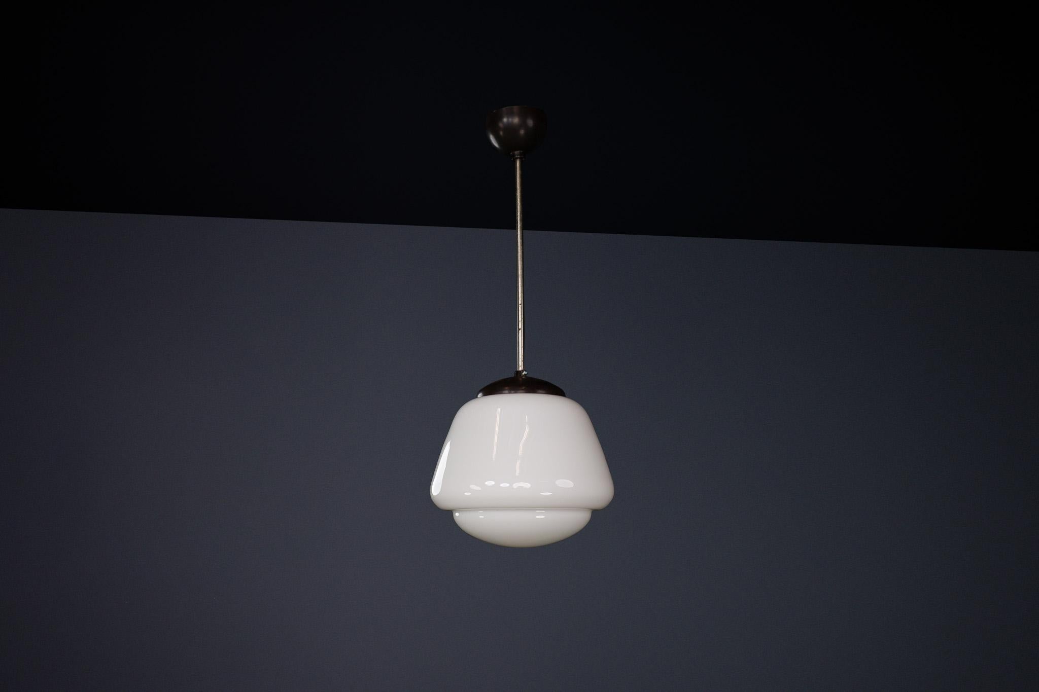 Bauhaus Opaline & Bakelite Pendant Lamp, Czech Republic 1950s In Good Condition For Sale In Almelo, NL