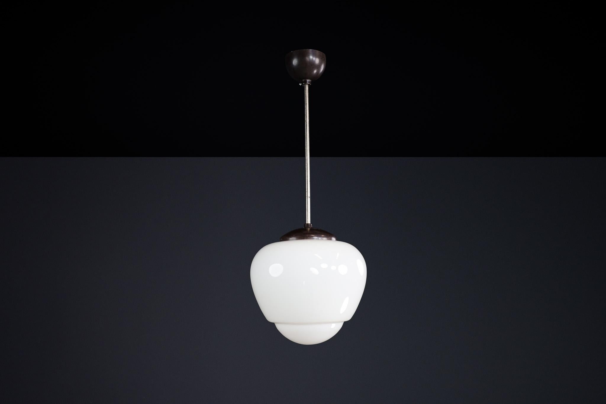 Bauhaus Opaline & Bakelite Pendant Lamp, Czech Republic 1950s In Good Condition For Sale In Almelo, NL