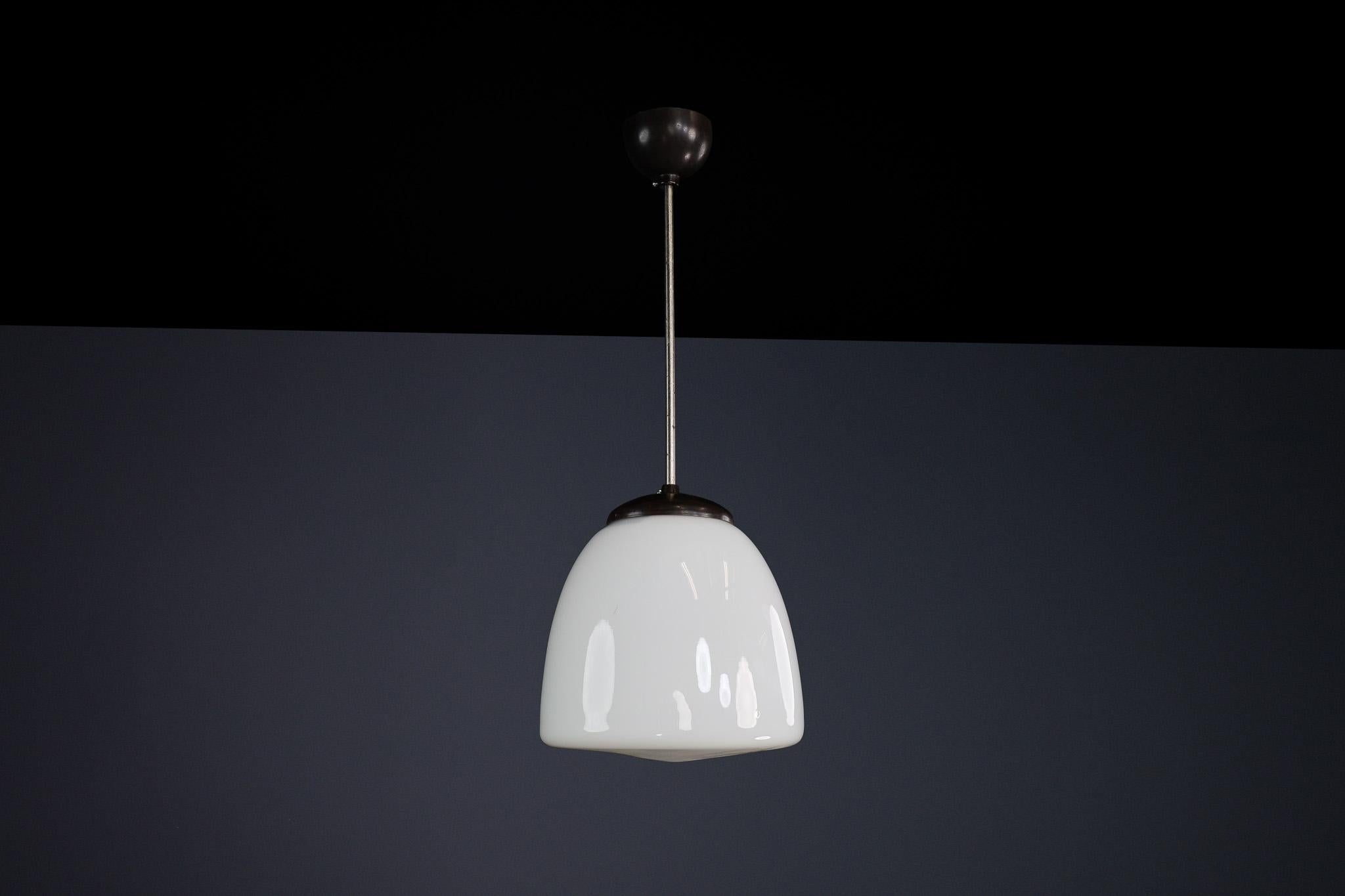 Bauhaus Opaline & Bakelite Pendant Lamp, Czech Republic 1950s In Good Condition For Sale In Almelo, NL