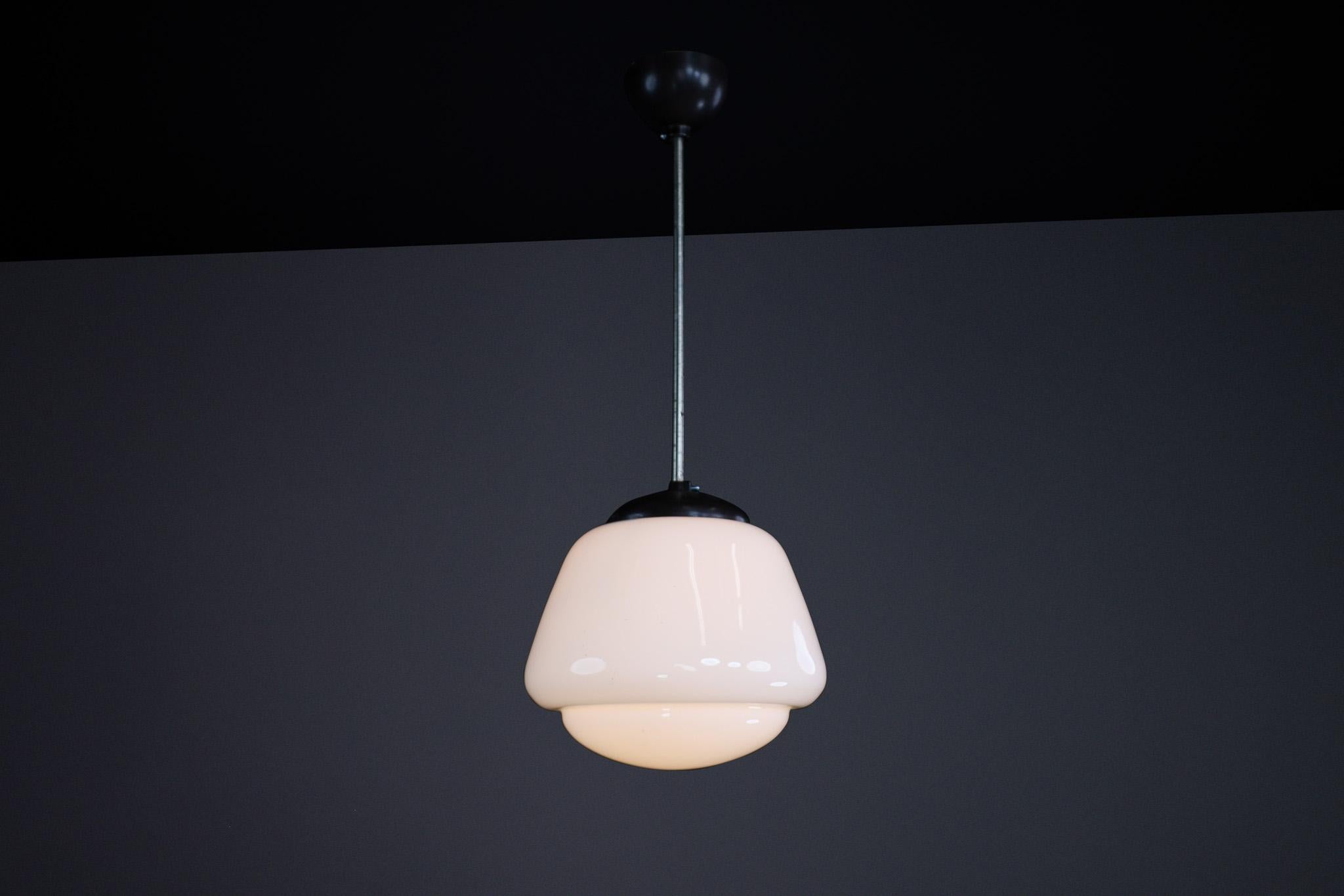 Mid-20th Century Bauhaus Opaline & Bakelite Pendant Lamp, Czech Republic 1950s For Sale