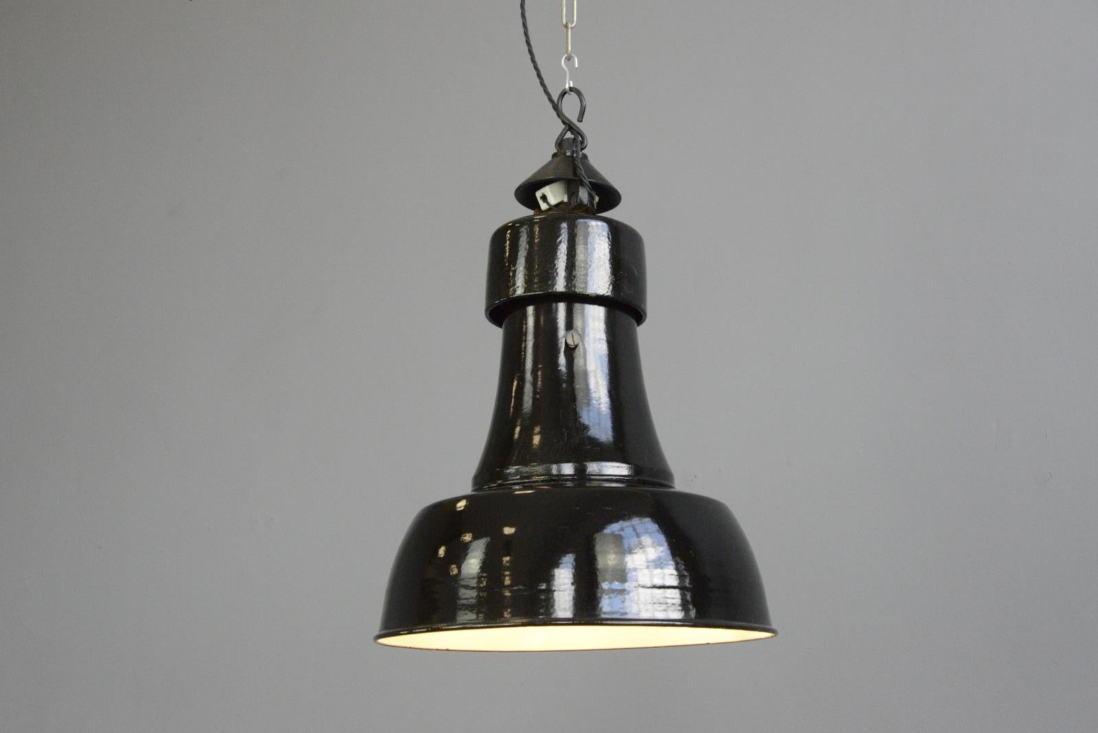 Bauhaus pendant light by Schaco, circa 1920s

- Vitreous black enamel shade
- White enamel inner reflector
- Cast iron top branded 