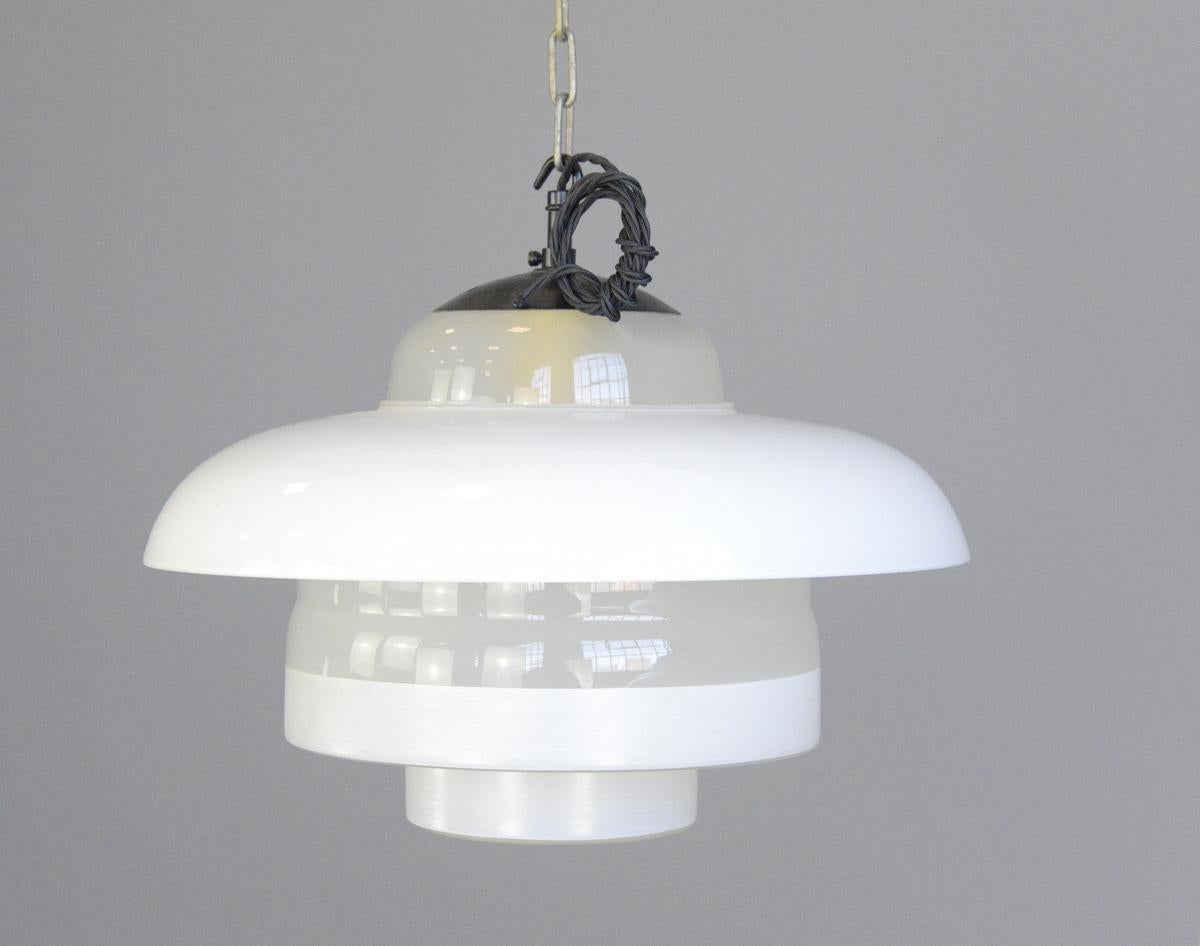 Bauhaus pendant lights by Mithras, circa 1930s.

- Price is per light
- Stepped Opaline glass
- Opaline glass outer ring
- Comes with 100cm of black braided cable
- Comes with ceiling rose and chain
- Takes E27 fitting bulbs
- Produced by