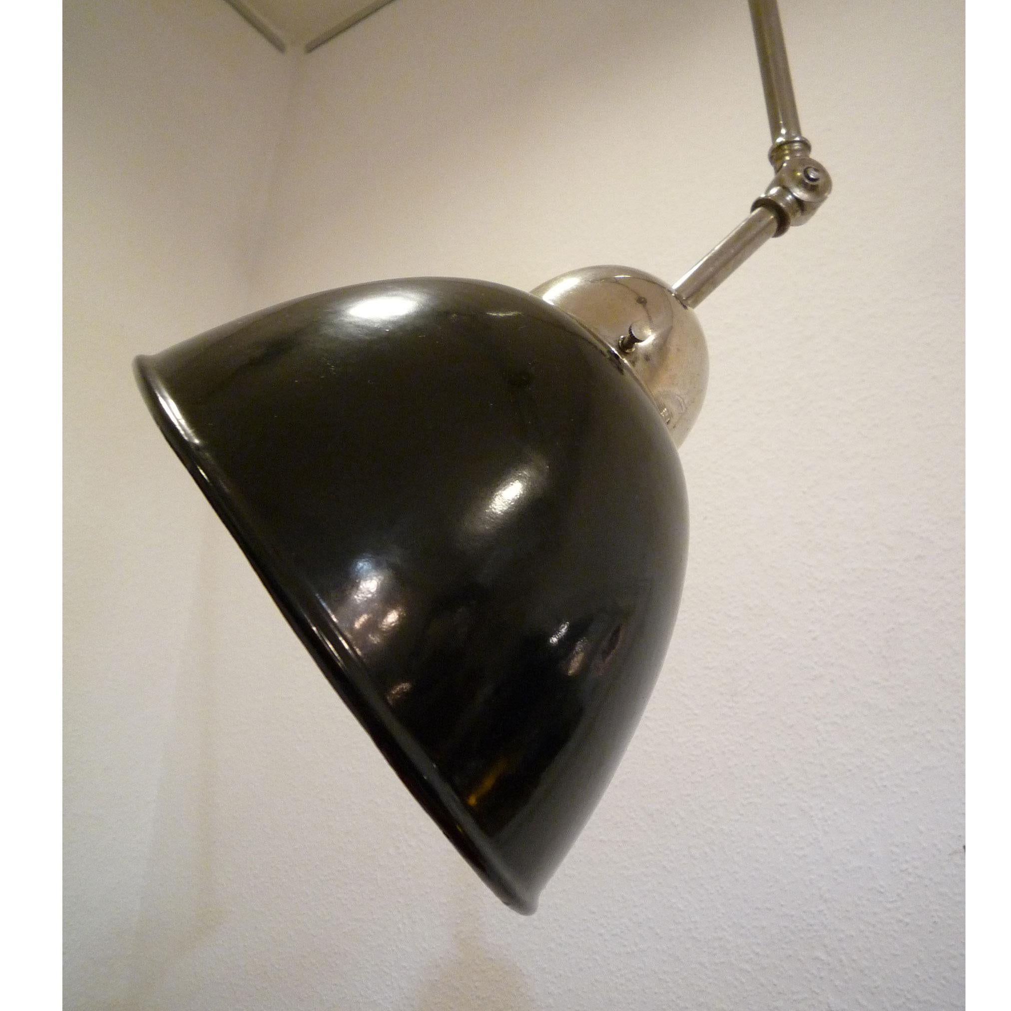 Bauhaus pendant wall lamp
Unusual pendant Luminaire for accentuating certain parts of the room or illuminating objects.

This lamp is really extraordinary in your function! The rotating, asymmetrical shade allows the light cone to be adjusted