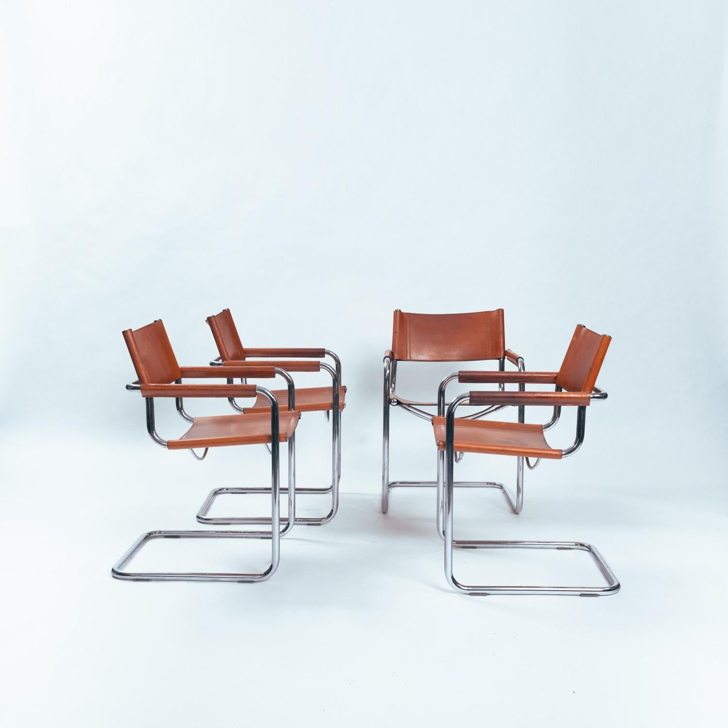 Bauhaus cantilever dining room chairs attributed to Mart Stam/ Marcel Breuer and manufactured in Italy, 1970s 
The chairs combine elegance and functionality by combining chrome-plated metal and leather in a stylish brandy brown tone.

They are a