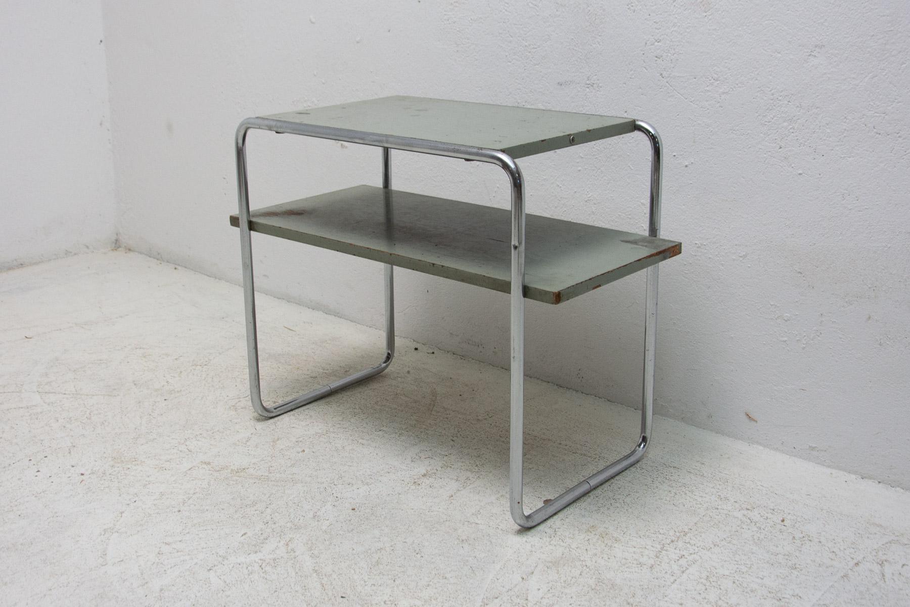 A side table with compartment, model no. B 12, designed by Marcel Breuer, Manufacturer: Mücke-Melder, Fryštát, Material: chrome-plated tubular structure, slatted wood, oak veneer, original paint. Original manufacturer’s label on the side of the top