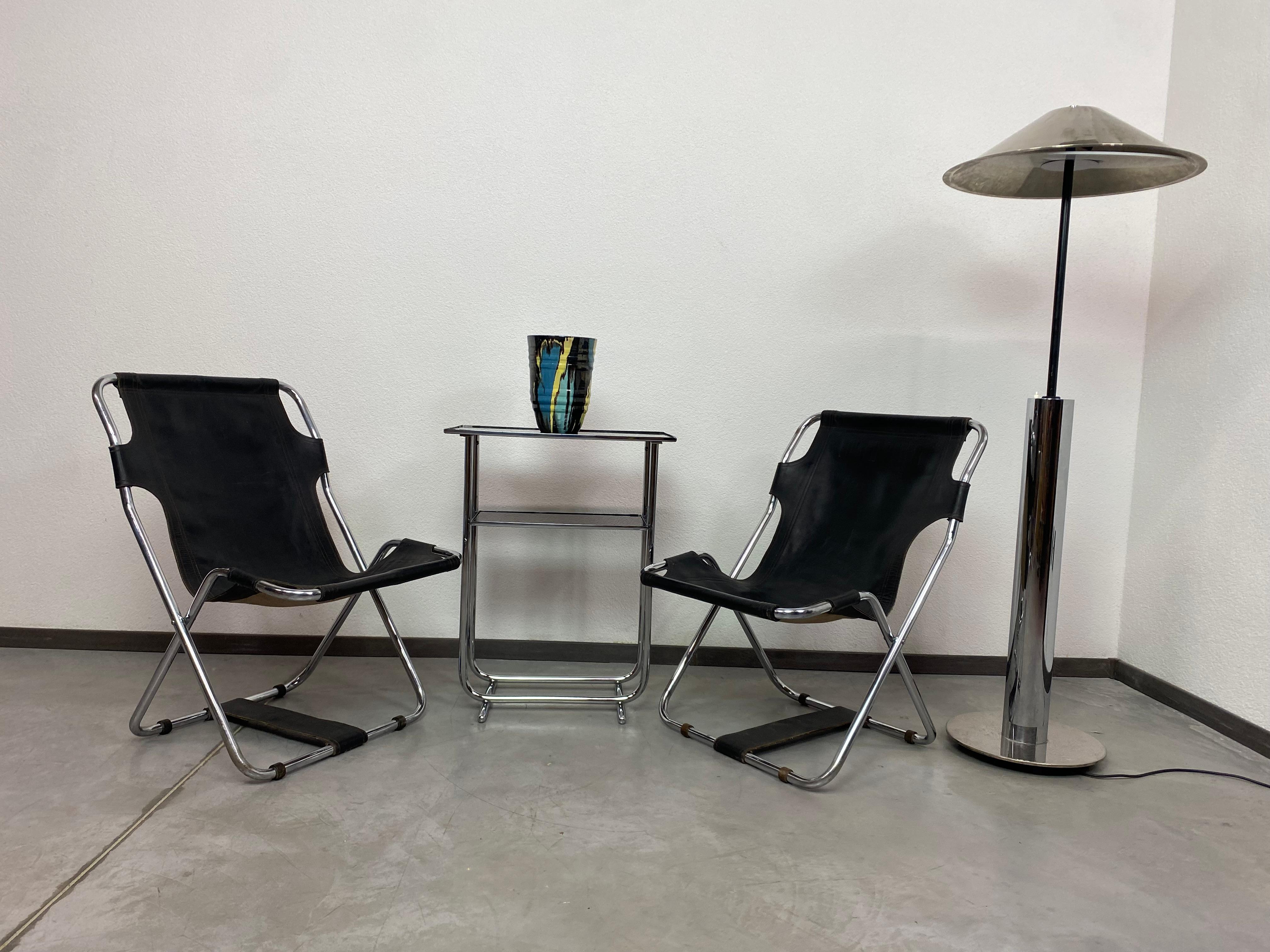 Bauhaus side table with black glass top in very nice original condition with signs of use.