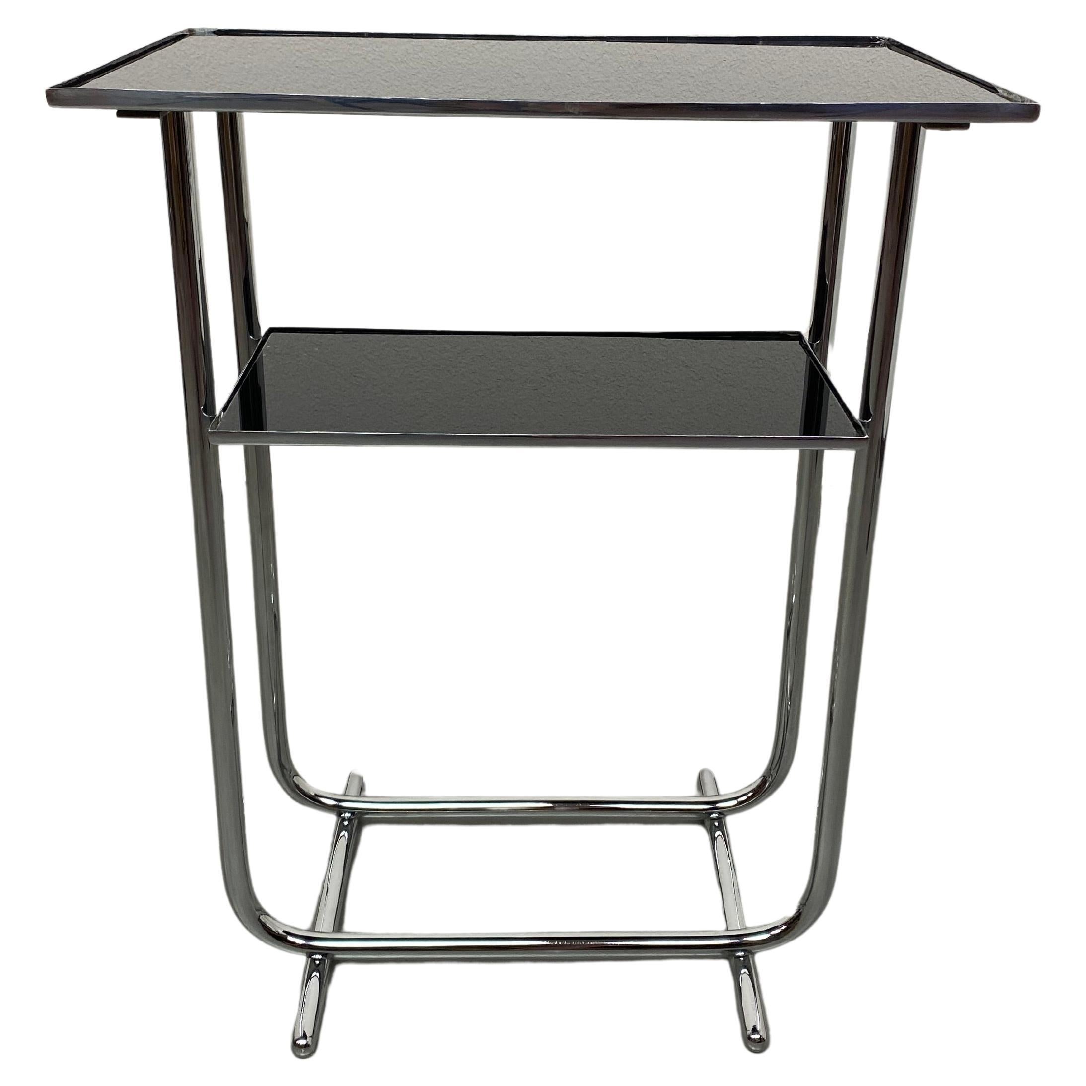 Bauhaus side table with black glass top For Sale