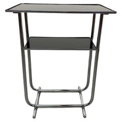 Used Bauhaus side table with black glass top