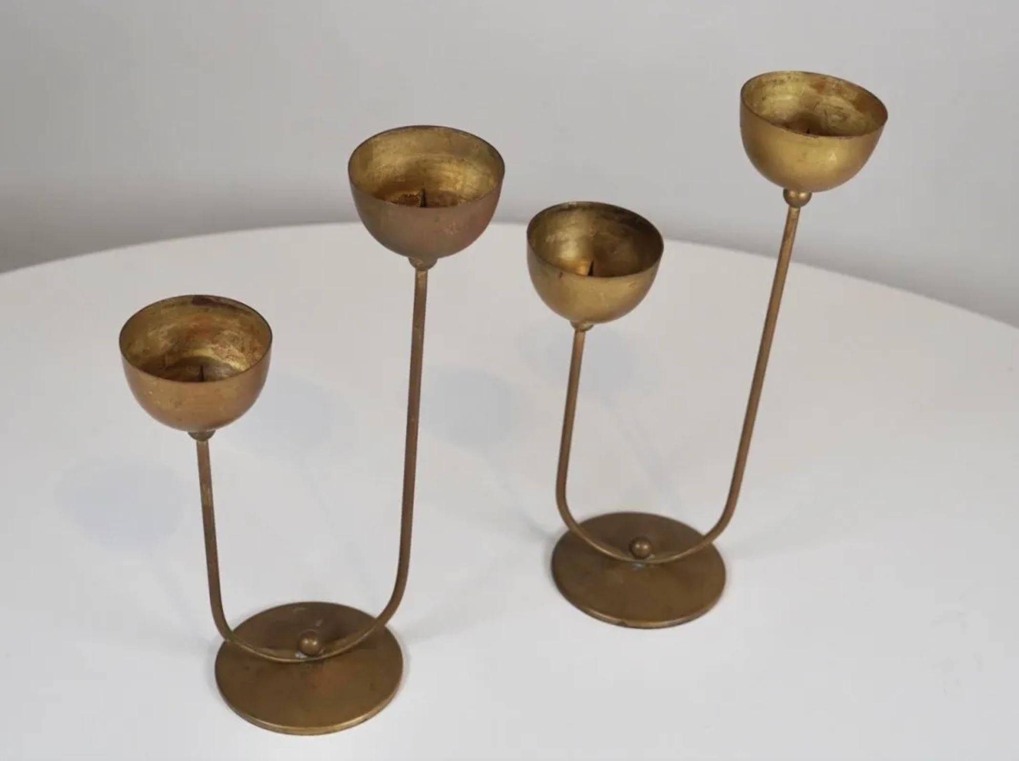 Pair of brass candlesticks in the style of the Bauhaus. Stamped 