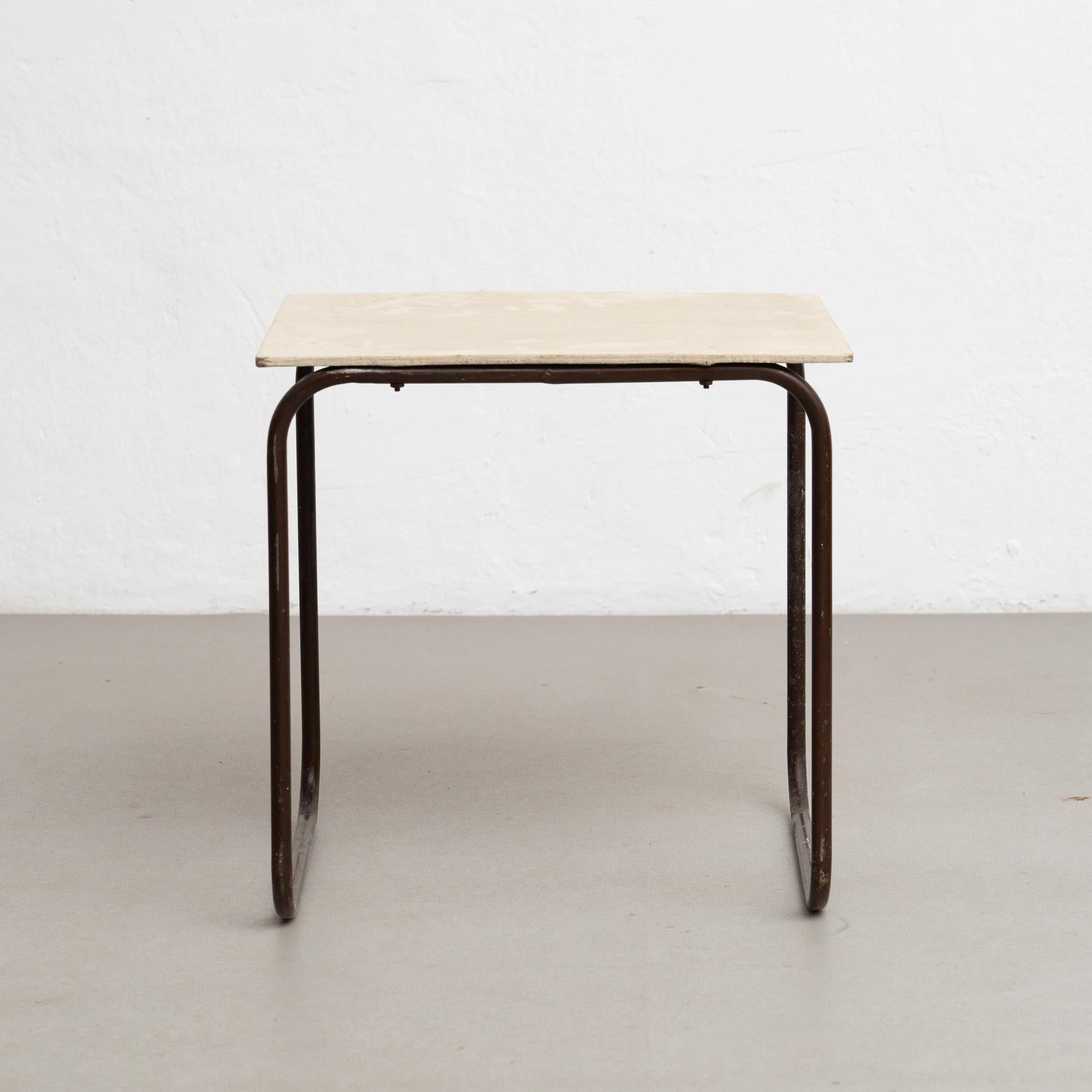 Bauhaus-Style Coffee Table - Germany, 1940s

This Bauhaus-style coffee table is an iconic piece of 20th-century design, clearly influenced by the modernist movement that shaped architecture and design during the era. Manufactured in Germany in the