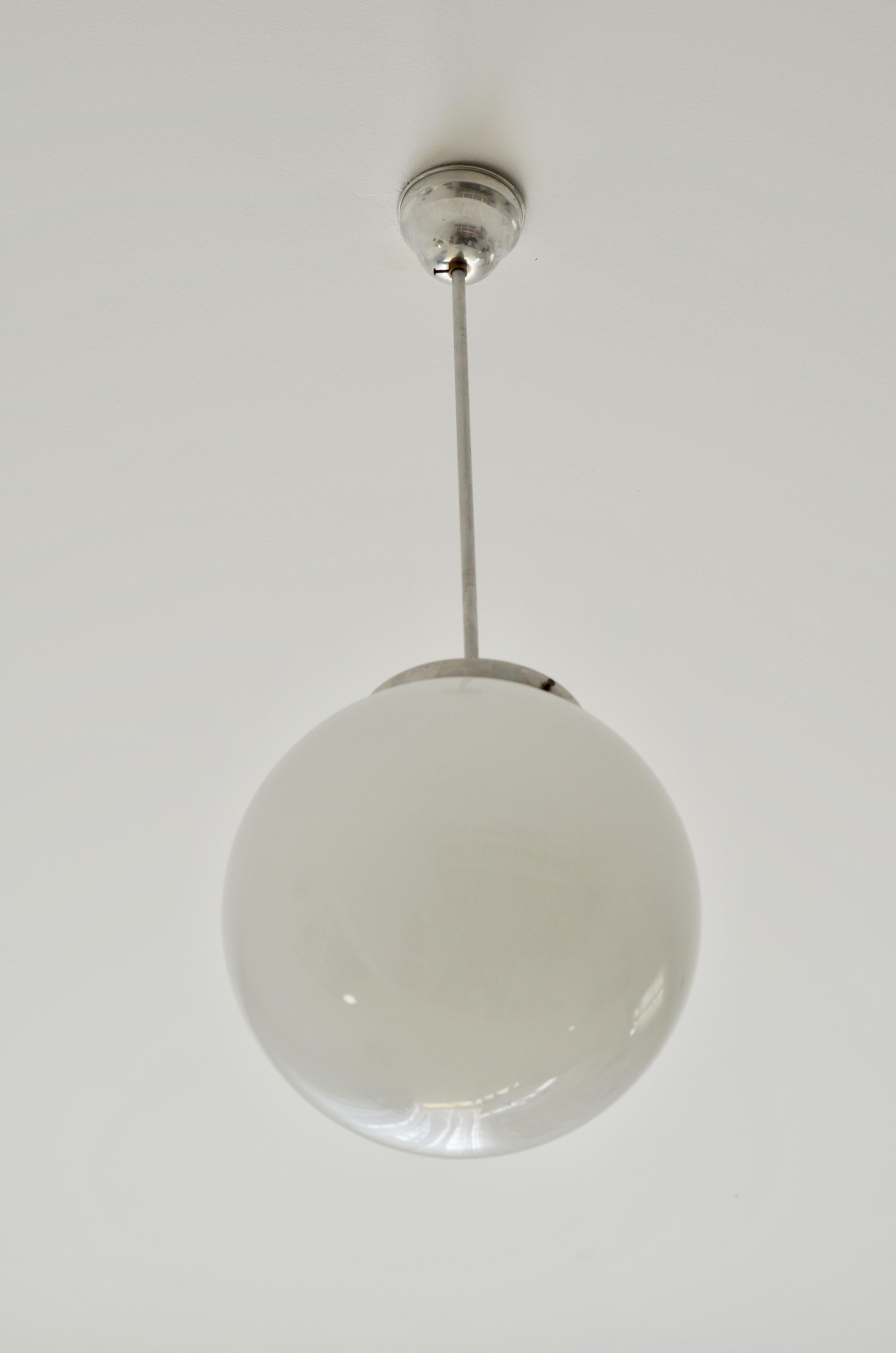 Bauhaus Style Pendant Light

Producer: EMI Poljčane, Slovenia, Yugoslavia

Period of Production: 1950s

Material: opaline glass, aluminum

Diameter: 29cm