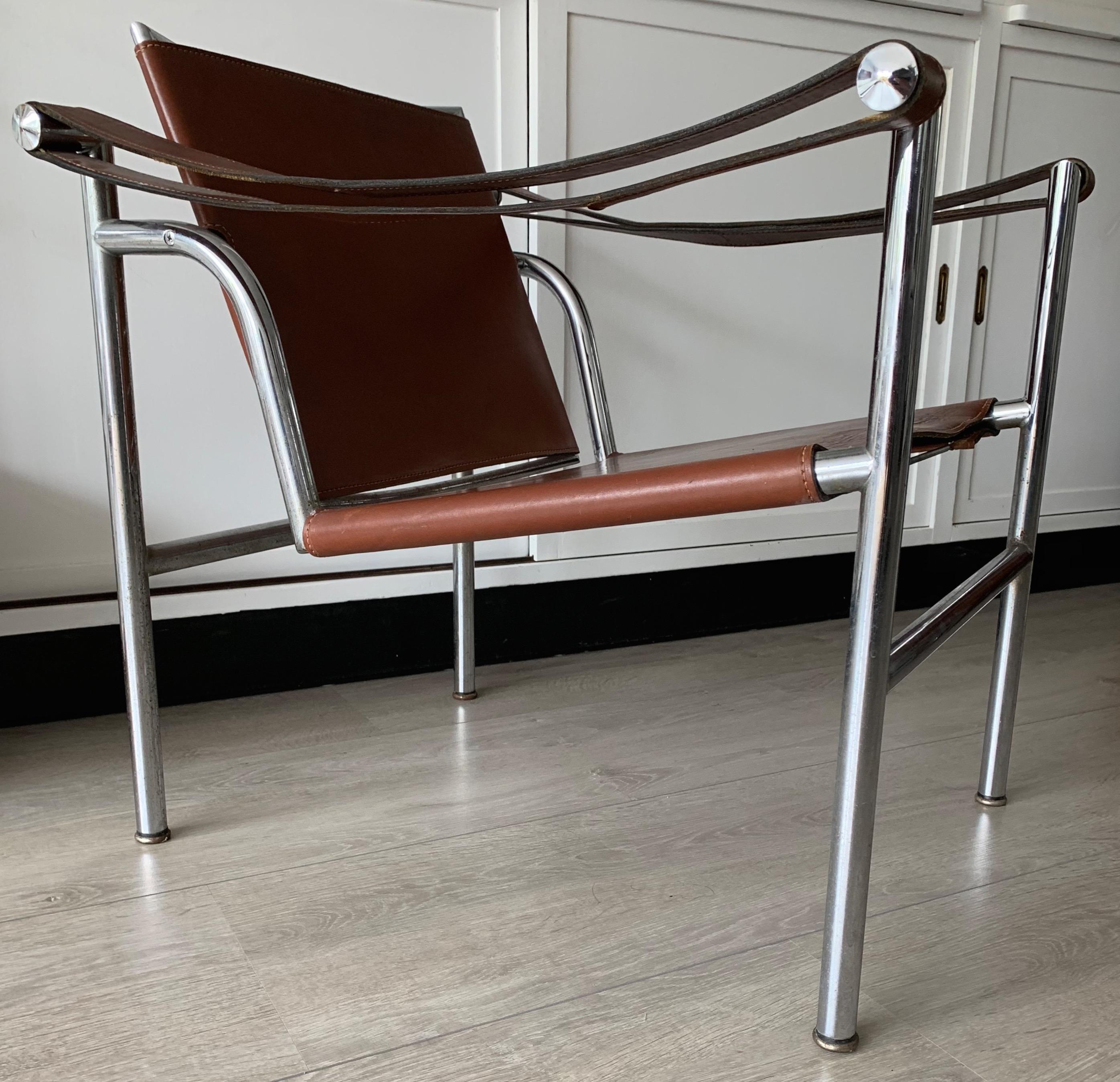 Rare and completely original Le Corbusier chair with leather seat and back.

Designed in the 1920s, this style icon (by one of the greatest designers and architects of the modern era) is truly timeless. From the low production number that is