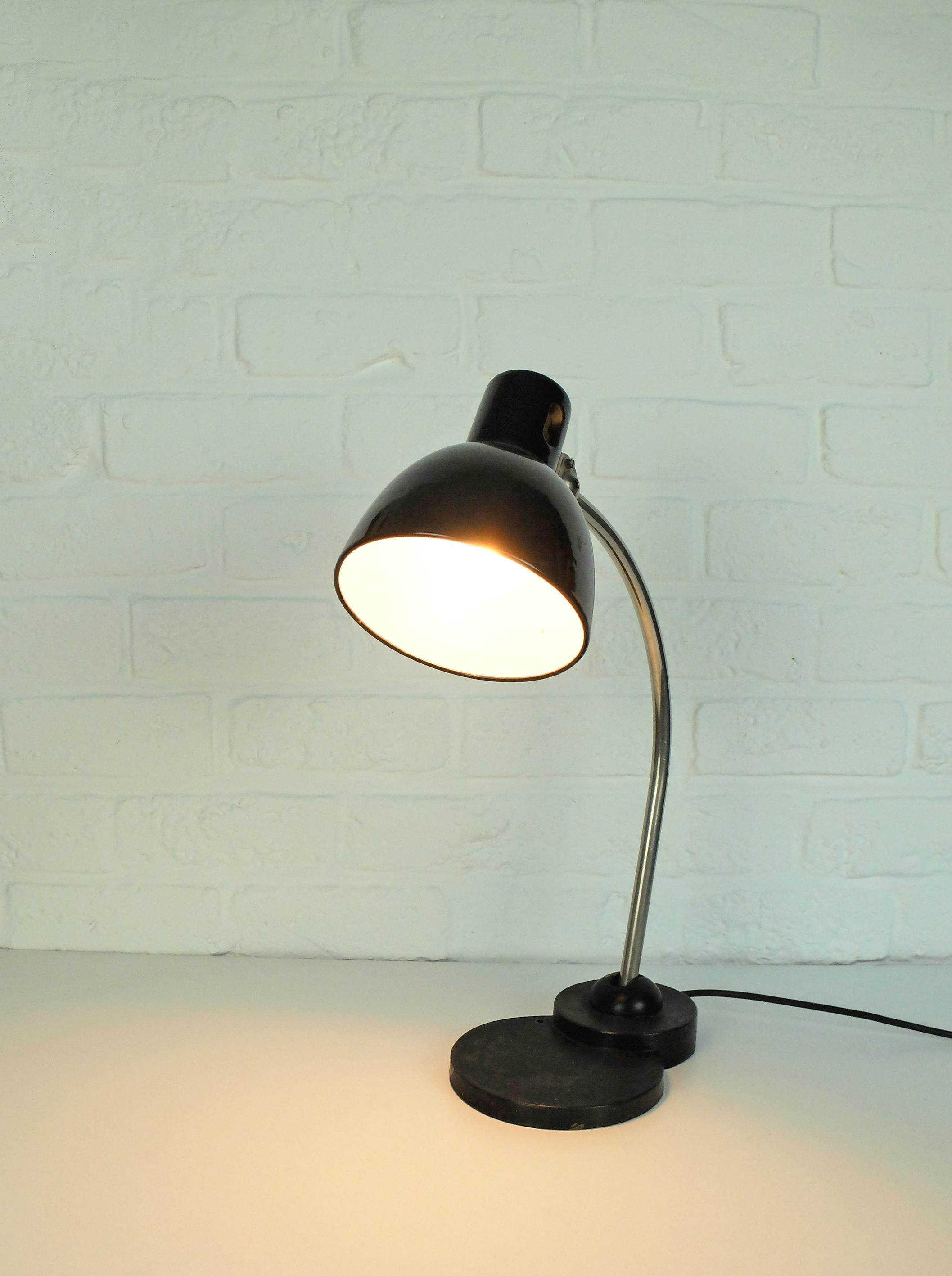 Zirax table or desk lamp manufactured by Dr. Ing. Schneider & Co, Frankfurt. Typical Bauhaus lamp from the 1930s.

Dr. Ing. Schneider & Co was founded in 1911 in Frankfurt am Main, by the brothers John J. Schneider Carl August Schneider and the