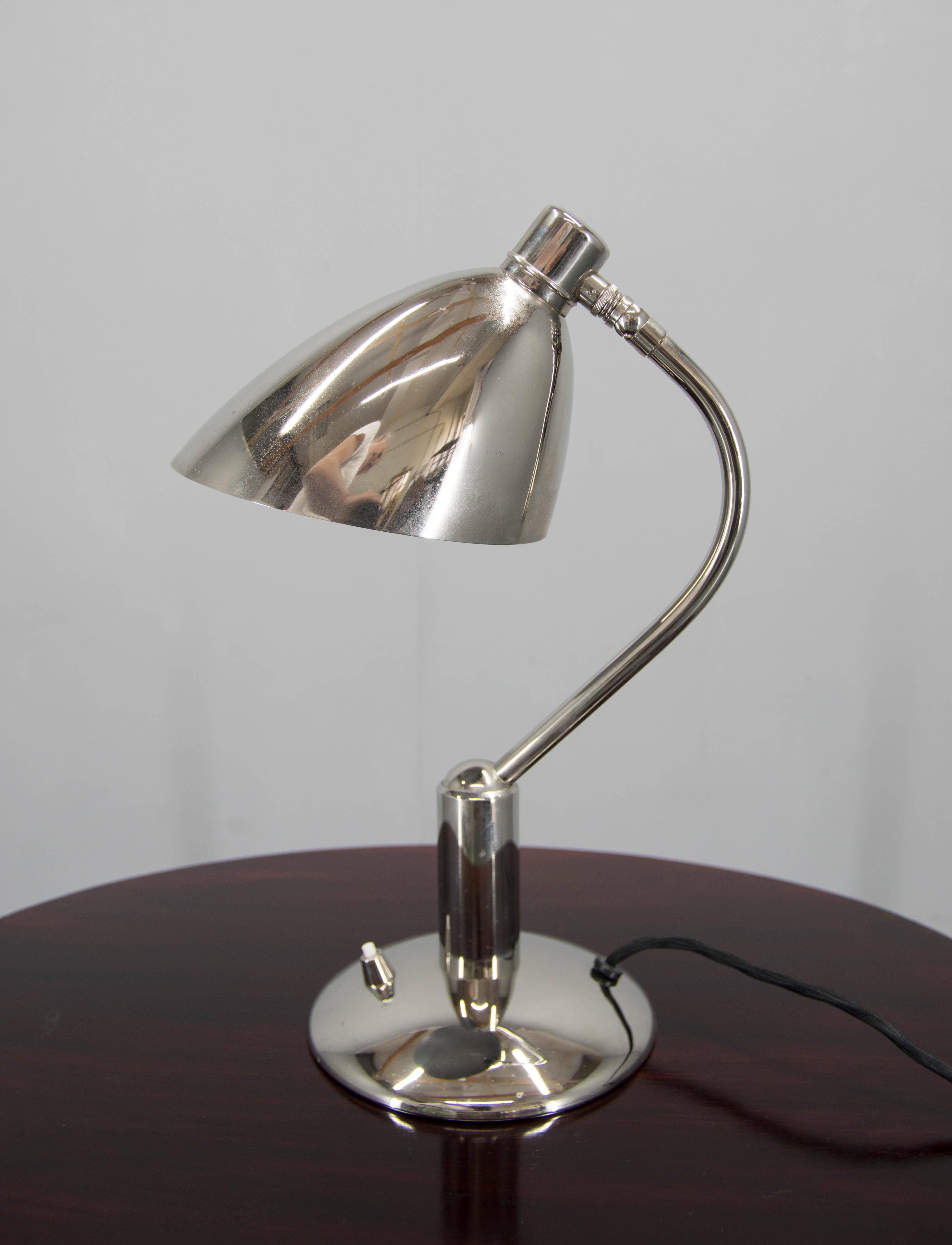 Iconic nickel table lamp designed by Frantisek Anyz in 1932. This item was produced in 2000s and is in a very good condition.
1x40W, E12-E14 bulb
US plug adapter included