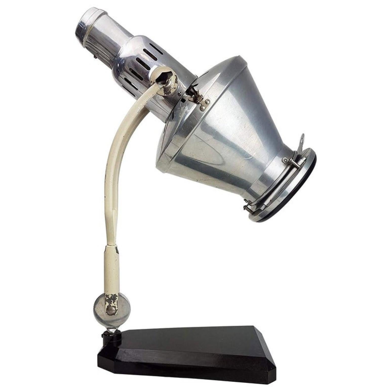 The Hanau company has built medical lamps since the 1920s. With a Bakelite counter. It is a Classic and always in style.
Sollux Hanau radiation lamp in restored original condition.

The lamp has been converted for ordinary household use with an