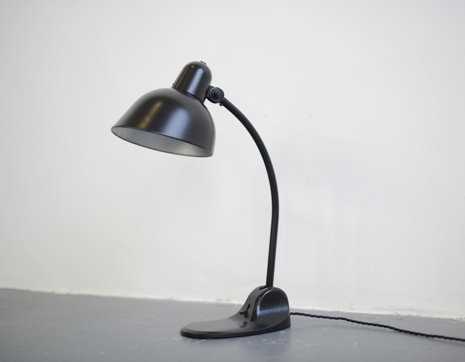 Bauhaus table Lamp by Siemens, circa 1930s

- Cast iron base with On/Off switch 
- Steel shade
- Curved steel adjustable arm
- German, 1930s
- Measures: 49cm tall x 20cm deep x 12cm wide

Siemens

Siemens & Halske was founded by Werner von