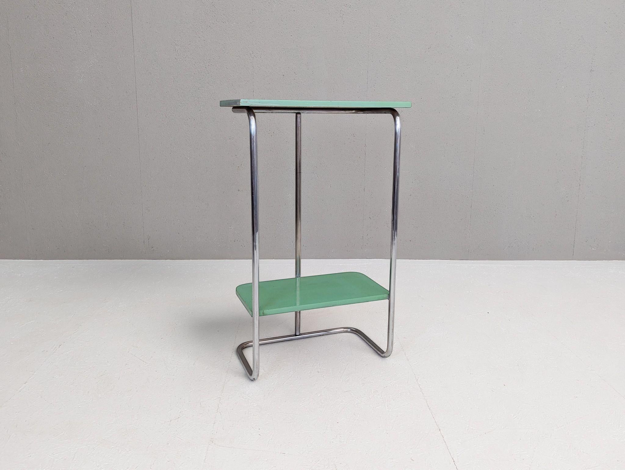 A distinctive example of Bauhaus design from the 1930s, this tubular steel console table was produced by Robert Slezák in former Czechoslovakia, a leading manufacturer of modernist metal furniture during the interwar period.

The piece features a