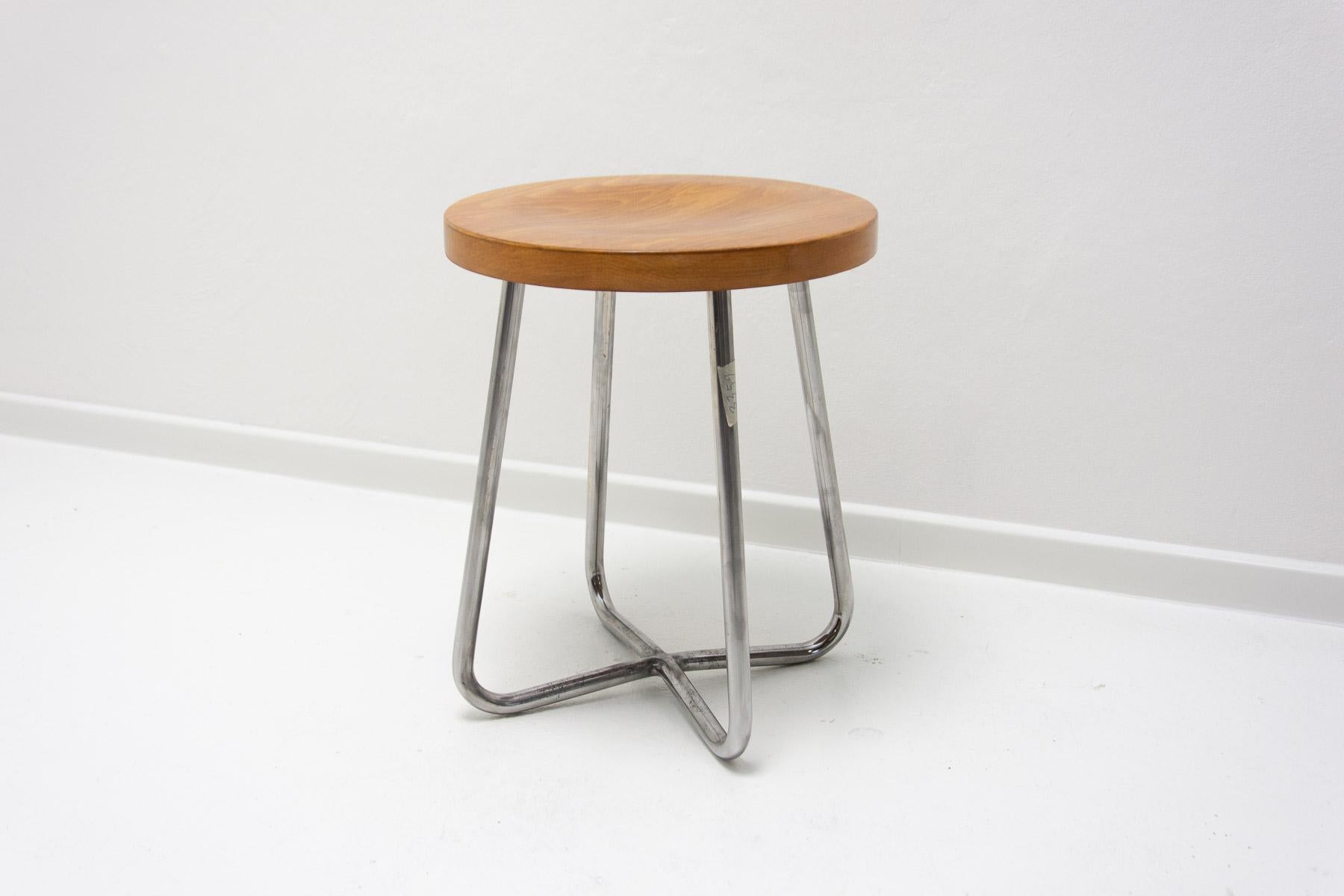 This chrome-plated stool was made by Slezák company, which focused on the production of tubular furniture, in the 1930s. It was manufactured in the former Czechoslovakia.

This is an expertly restored original, painted in a high gloss to the shade