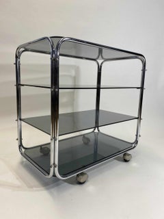 Carrello tubolare Bauhaus con piani in vetro nero