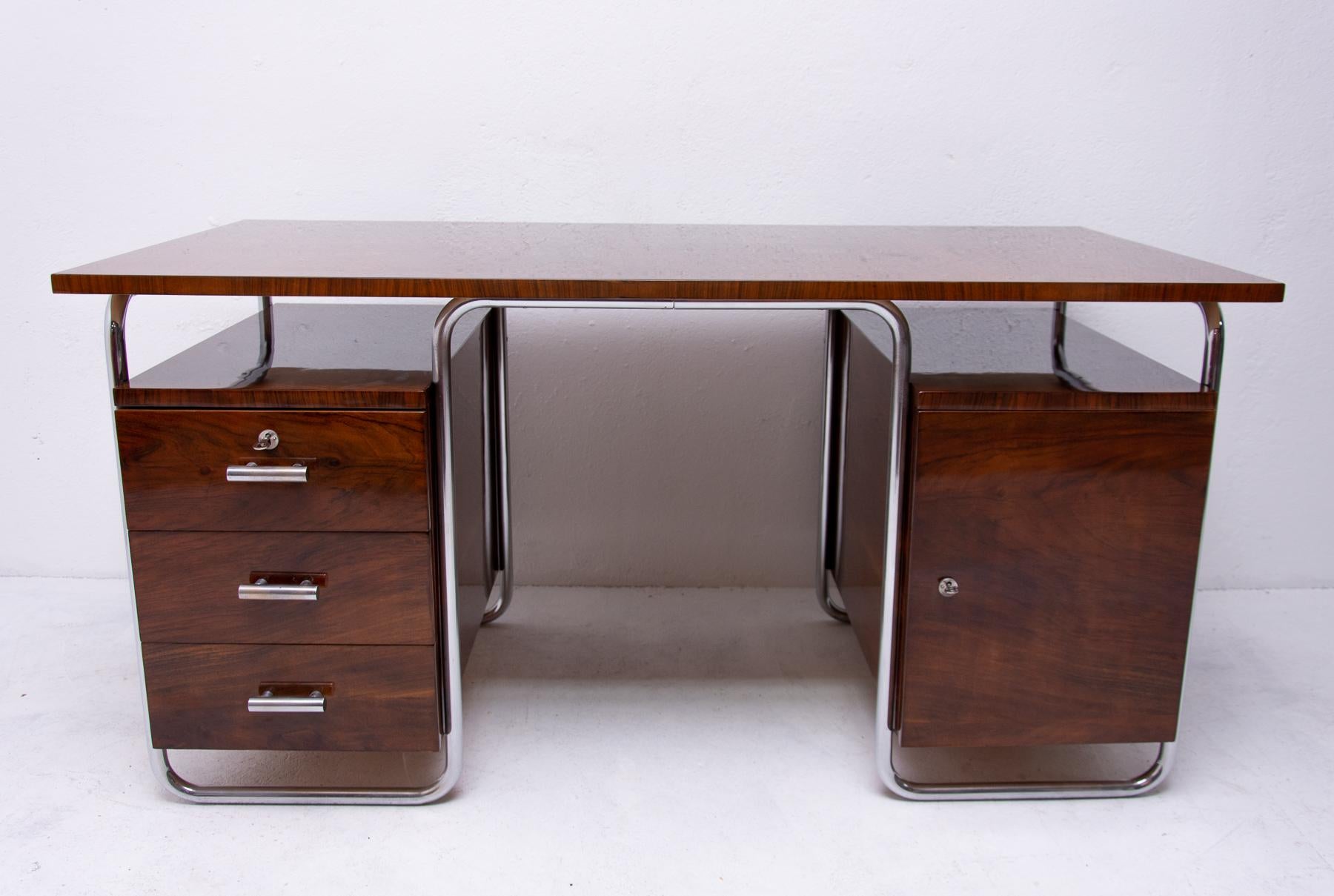Tubular massive writing desk from the 1930s from the Bauhaus period. It was designed by legendary Jindrich Halabala for the ÚP Závody Brno. A typical example of European functionalism and the works of leading designers of this period such as Marcel