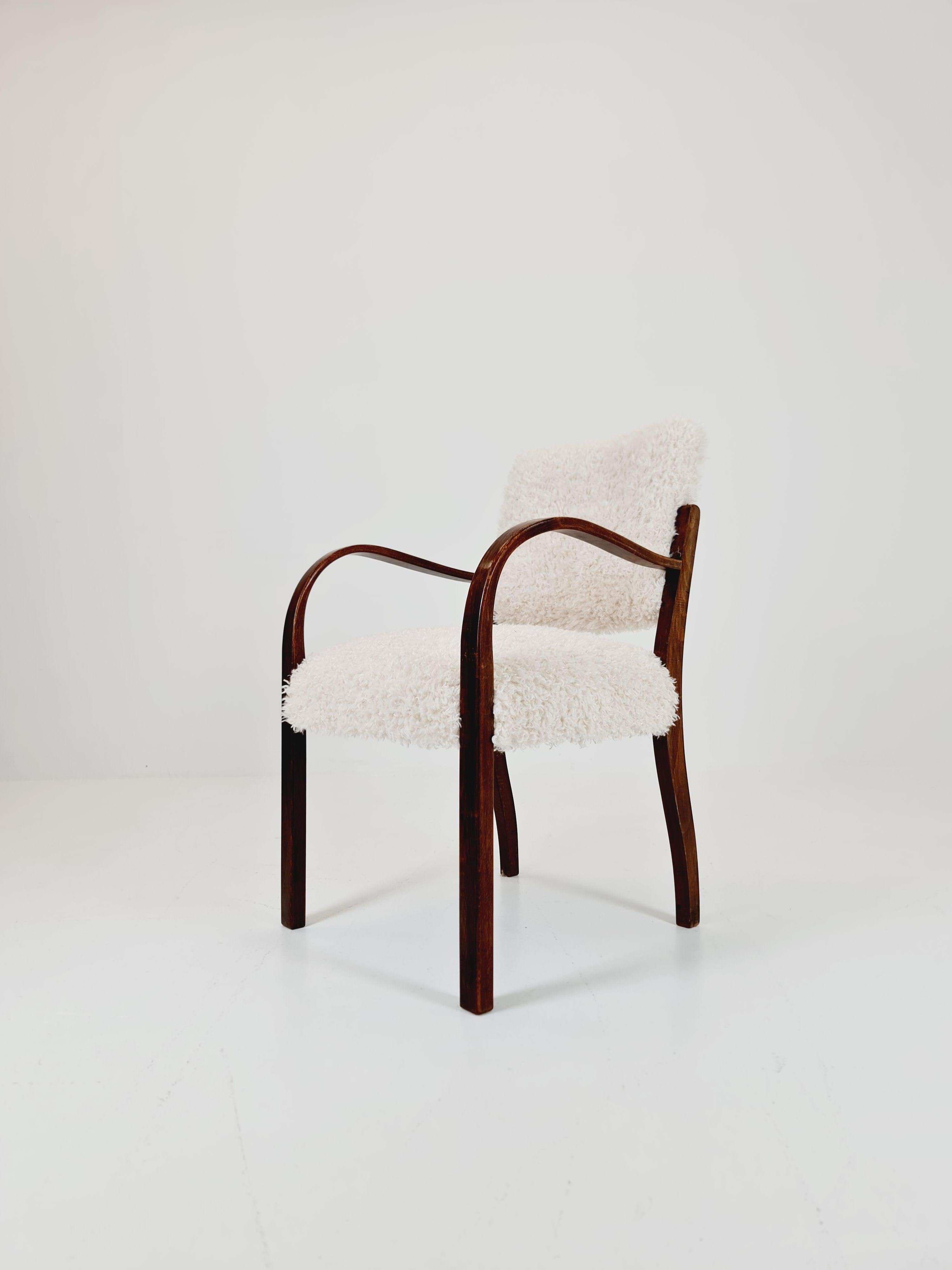 Bauhaus vintage papercord armchair by Erich Dieckmann 1930s

It is in great condition. However, as with all the vintage items some minor wear marks should be expected. The upholstered Seats completely restored with High quality fabric  
 Made of