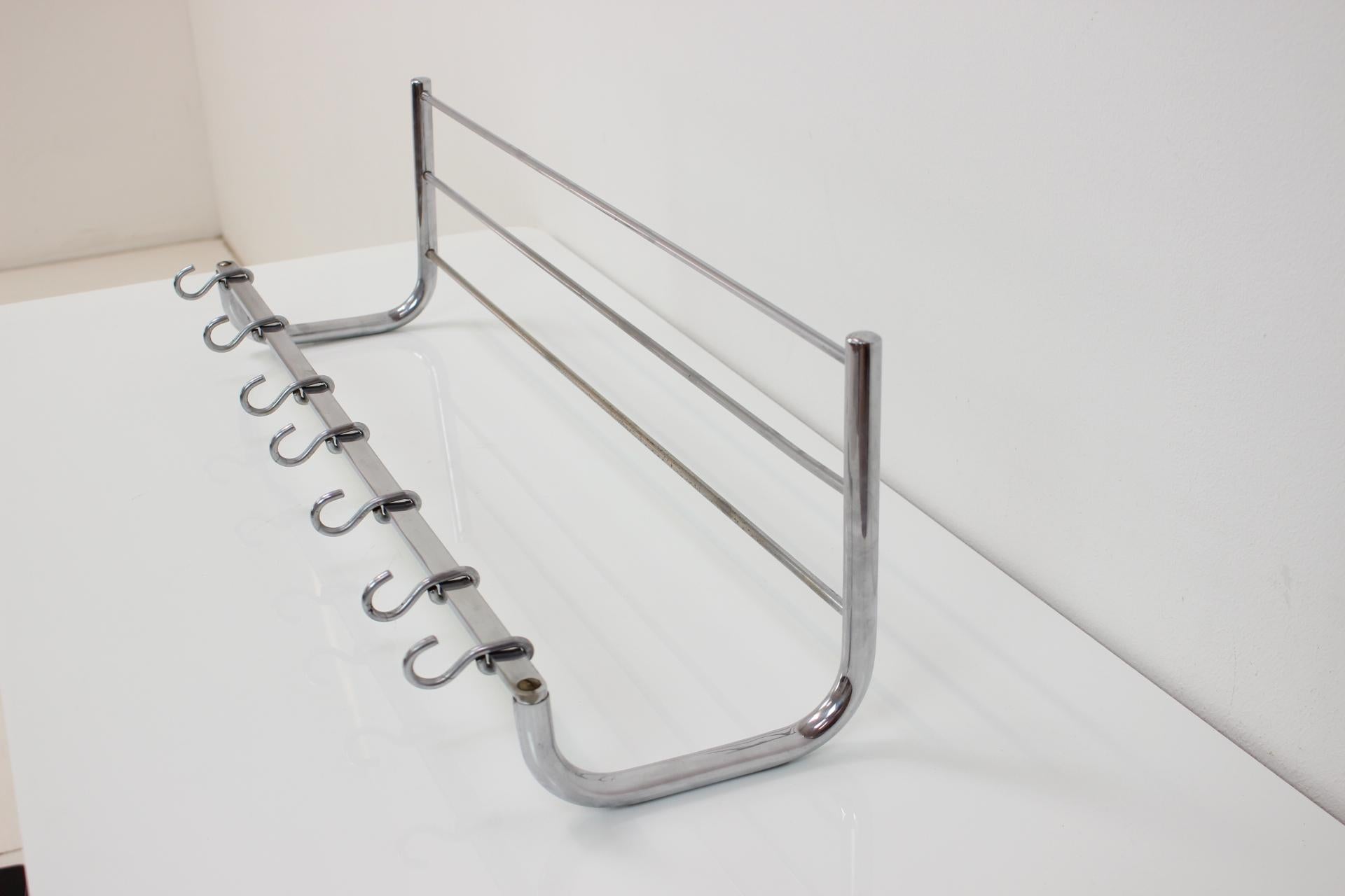 Bauhaus long coat hanger with 7 hooks.
Cleaned.