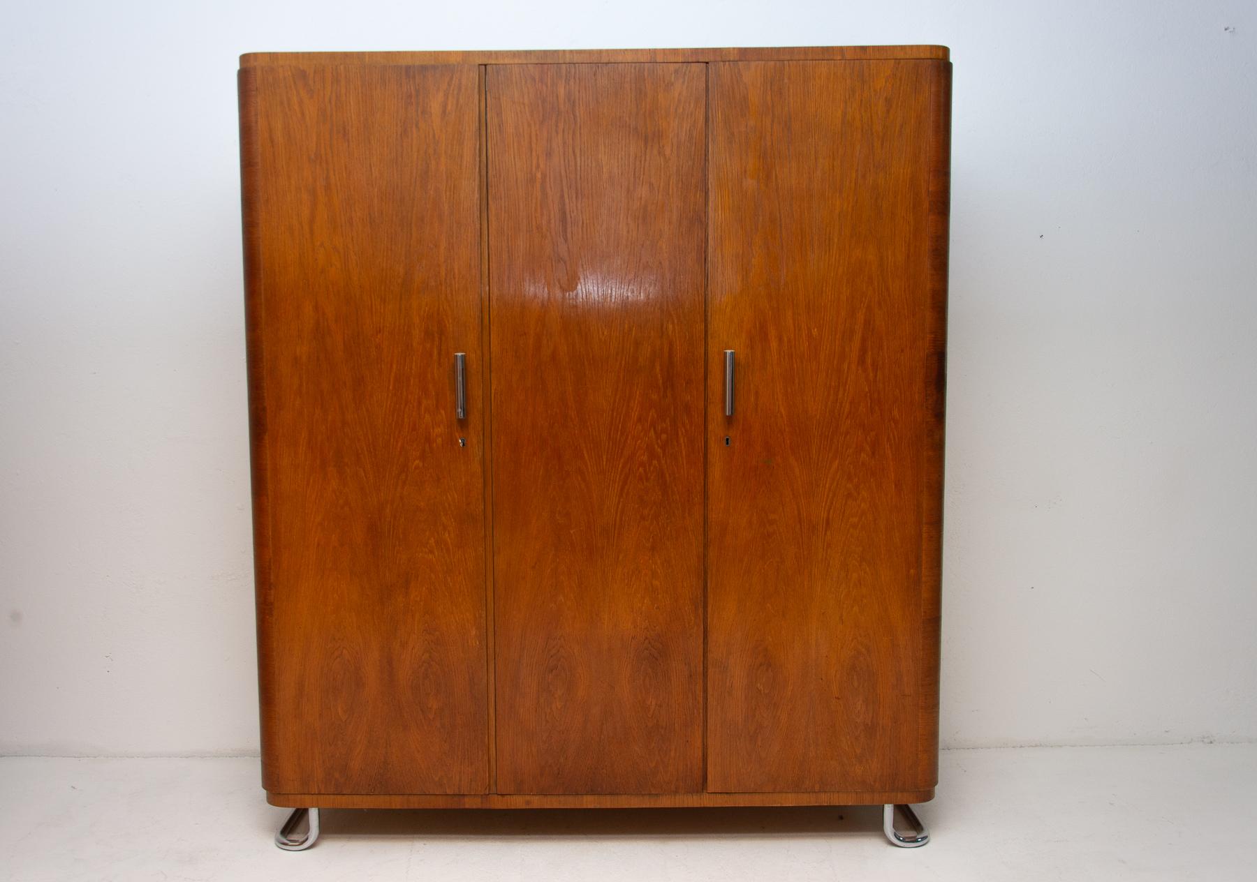 Wardrobe with chrome elements from the Bauhaus period. It was made in the former Czechoslovakia by Vichr & spol in the 1930s.
This is a typical example of residential furniture from the Bauhaus period in Central Europe. Chrome is in very good